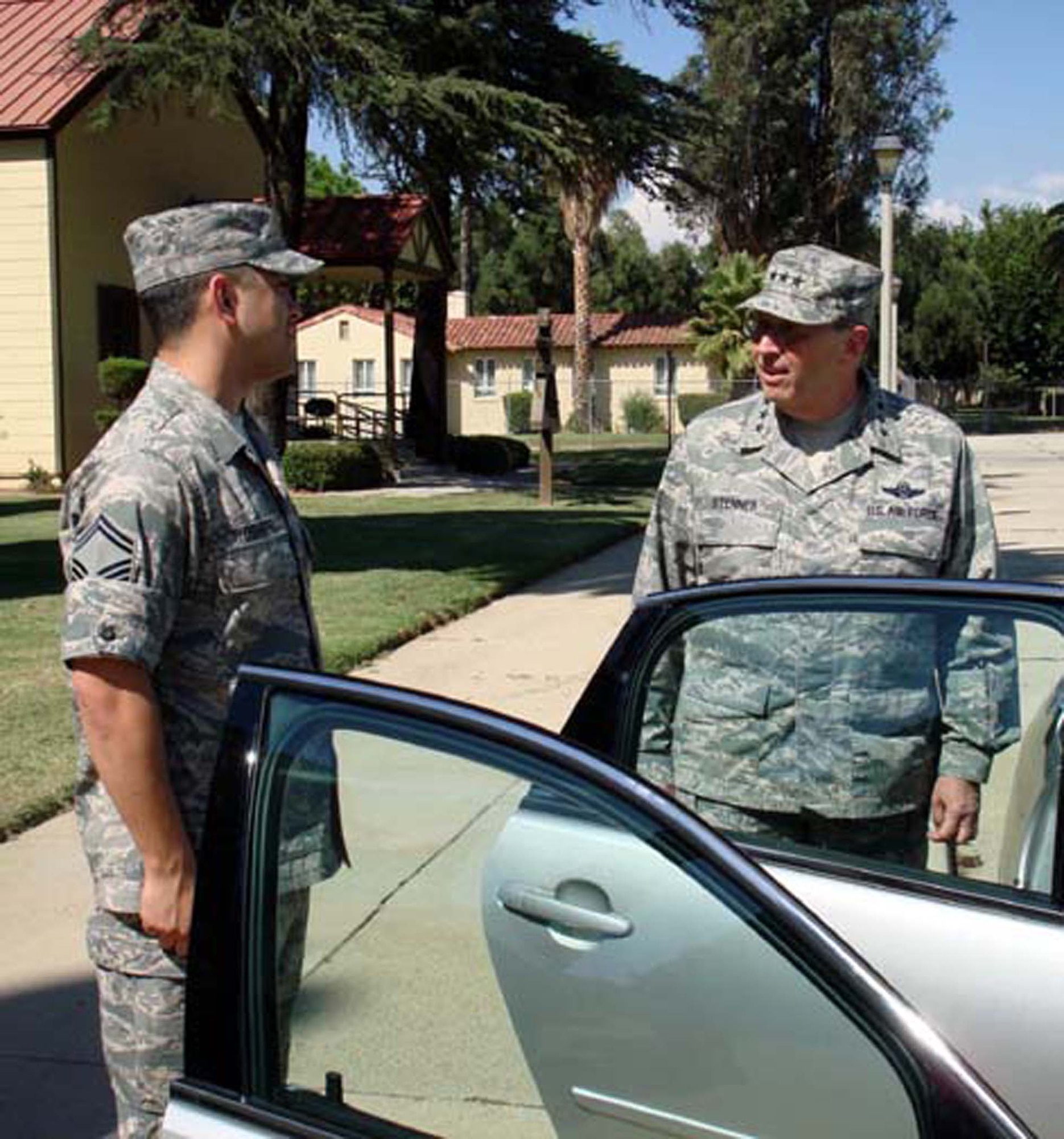 Lt. Gen. Charles E. Stenner Jr., Chief and Commander, Air Force Reserve Command, questions SMSgt. Marcel Rodarte, Fourth Air Force Honor Guard member, about the all-volunteer group.  The general was at March ARB, Calif for an August 6, 2008 visit to the numbered Air Force.  (U.S. Air Force photo/MSgt. Linda E. Welz)