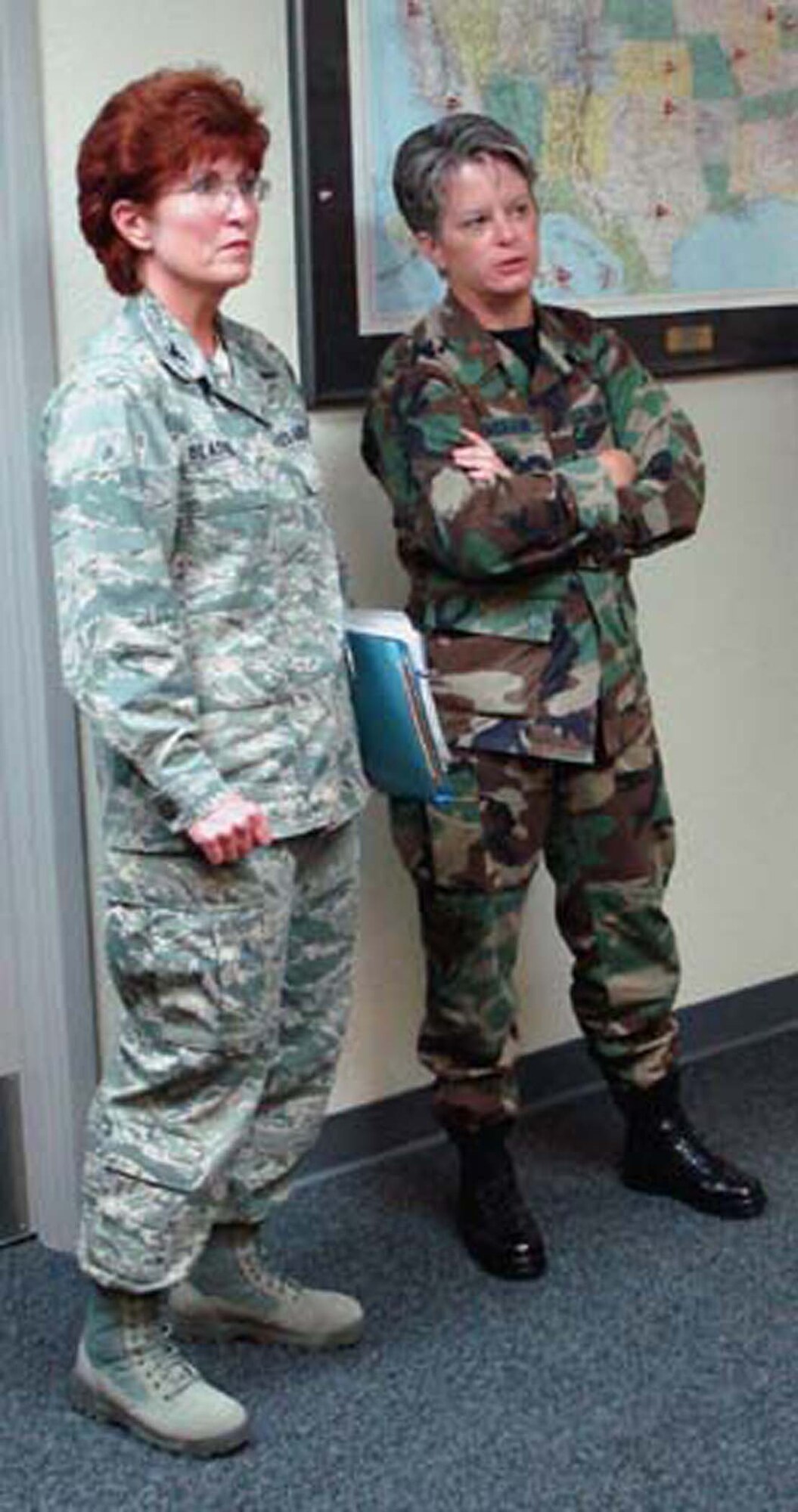 Col. Patricia Blassie (L), Executive Officer for Air Force Reserve Commander Lt. Gen. Charles E. Stenner, listens as Maj. Maureen H. McAllen, Executive Officer for Fourth Air Force Commander Maj. Gen. Robert E. Duignan, explains Fourth Air Force command post operations.  The colonel accompanied the AFRC commander on a visit to the numbered Air Force at March ARB, Calif. on August 6, 2008.  (U.S. Air Force photo/MSgt. Linda E. Welz)
