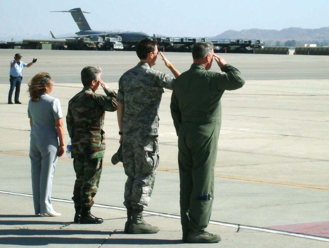 Representatives from March ARB, Calif. salute Lt. Gen. Charles E. Stenner Jr., Air Force Reserve Commander, at his departure from the base following an August 6, 2008 visit to the Southern California location.  From left are Ms. Elaine Plein, 452nd Air Mobility Wing protocol office, Maj. Maureen H. McAllen, Fourth Air Force Executive Officer, Col. Jeffrey K. Barnson, 452nd AMW Vice Commander, and Maj. Gen. Robert E. Duignan, 4th AF Commander.  (U.S. Air Force photo/Maj. Andra P. Higgs)
