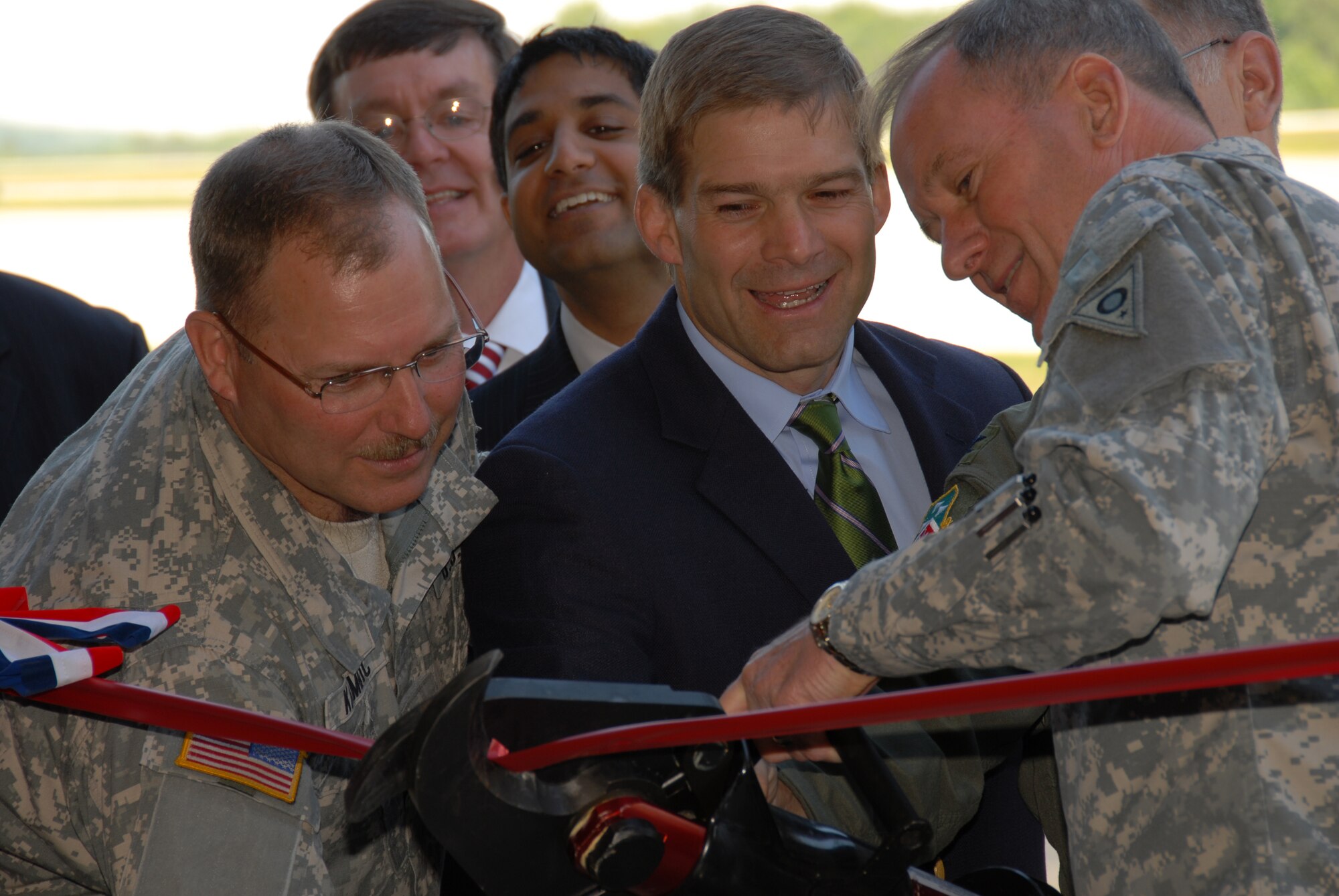 (listed left to right) Assistant Adjutant General, Ohio Army National Guard, Brigadier Matthew L. Kambic; Vice President of Goyal Industries, David Howard; Ohio (Dem) 73rd District State Representative Jay Goyal; Ohio (Rep) 4th District Congressman Jim Jordan; 179th Airlift Wing Commander, Colonel Mark L. Stephens and Adjutant General of Ohio Joint Force Headquarters, Major General Gregory L. Wayt at the ribbon cutting ceremony for the new Army Guard Fire Station at Mansfield Lahm Airport, Mansfield, Ohio on May 30, 2008. The occasion marked the first Army Guard installation at the Mansfield Lahm Guard Base which has only been an Air National Guard base since opening in 1948. (U.S Air Force photo by A1C Joseph Harwood) (Released)