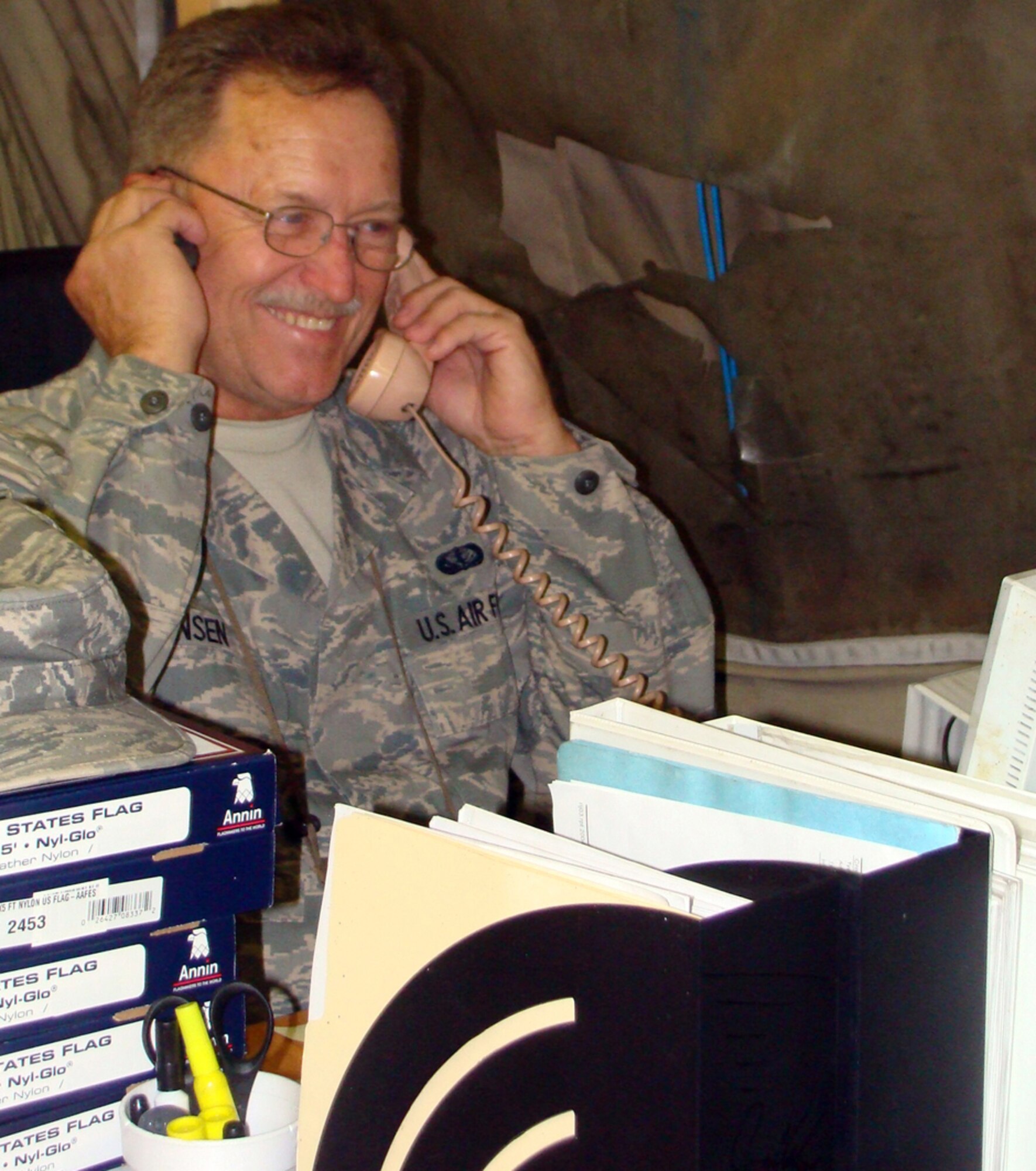 MANAS AIR BASE, KRYGYZ REPUBLIC--Staff Sgt. Albert Jensen is all smiles as he says, 'I Do' and marries his long time sweetheart back in Hawaii, Charlene Kehaualani Meyer, through a proxy marriage ceremony here, Aug. 8. After some research, the couple discovered that the state of Montana authorizes marriage by proxy, with the only legal requirement for a double-proxy wedding being that at least one member of the couple is either a Montana resident or a member of the United States armed forces. The wedding spanned 16 time zones and 16,000 miles between the bride in Hawaii, chaplain in Montana, and groom in the Kyrgyz Republic. (Air Force courtesy photo) 