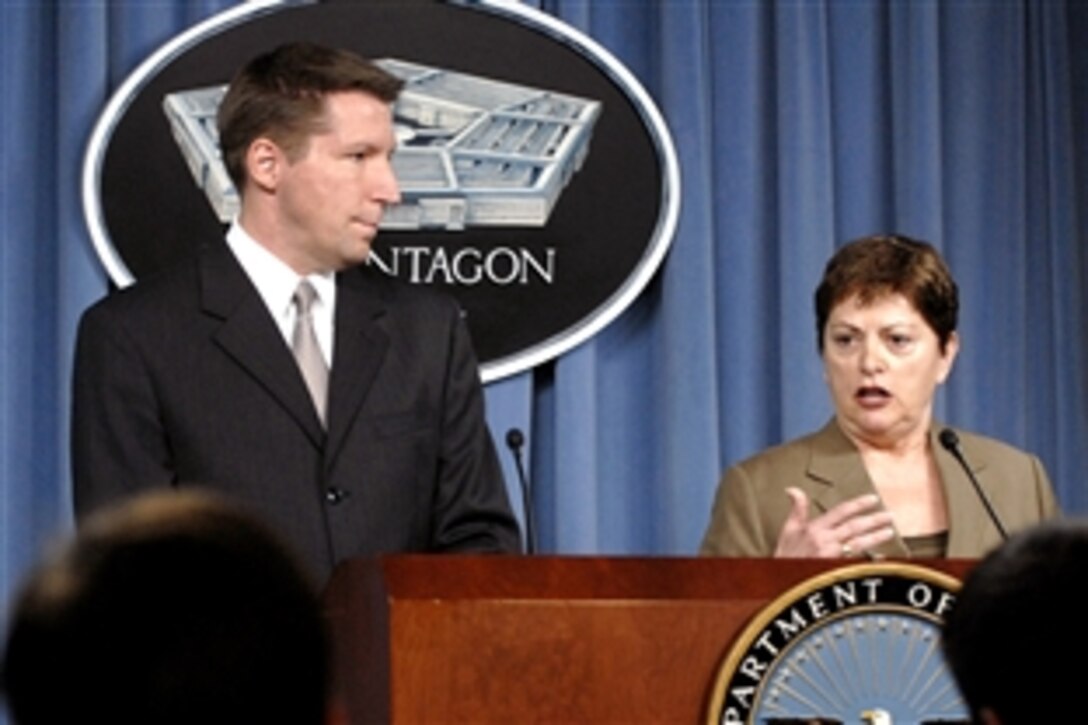 Polli K. Brunelli, director, right, and J. Scott Wiedmann, deputy director of the Federal Voting Assistance Program, speak to reporters during a press briefing in the Pentagon, Aug. 15, 2008, concerning Defense Department efforts to facilitate absentee voting.  