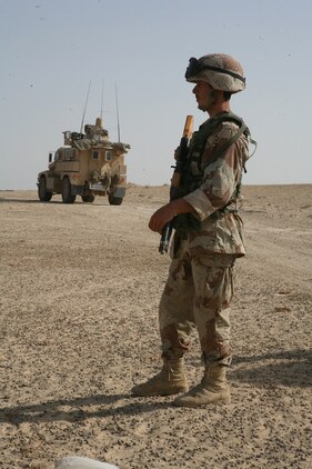 SADAMIYAH PENINSULA, Iraq (August 14, 2008) – An Iraqi soldier with 1st Battalion, 2nd Brigade, 1st Iraqi Army Division, patrols during a 72-hour sweep operation Aug. 15.  At the request of Iraqi leaders, Marines with Company A, 1st Battalion, 2nd Marine Regiment, Regimental Combat Team 1, provided assistance for the Iraqi-led operation. (Official U.S. Marine Corps photo by Lance Cpl. Scott Schmidt)