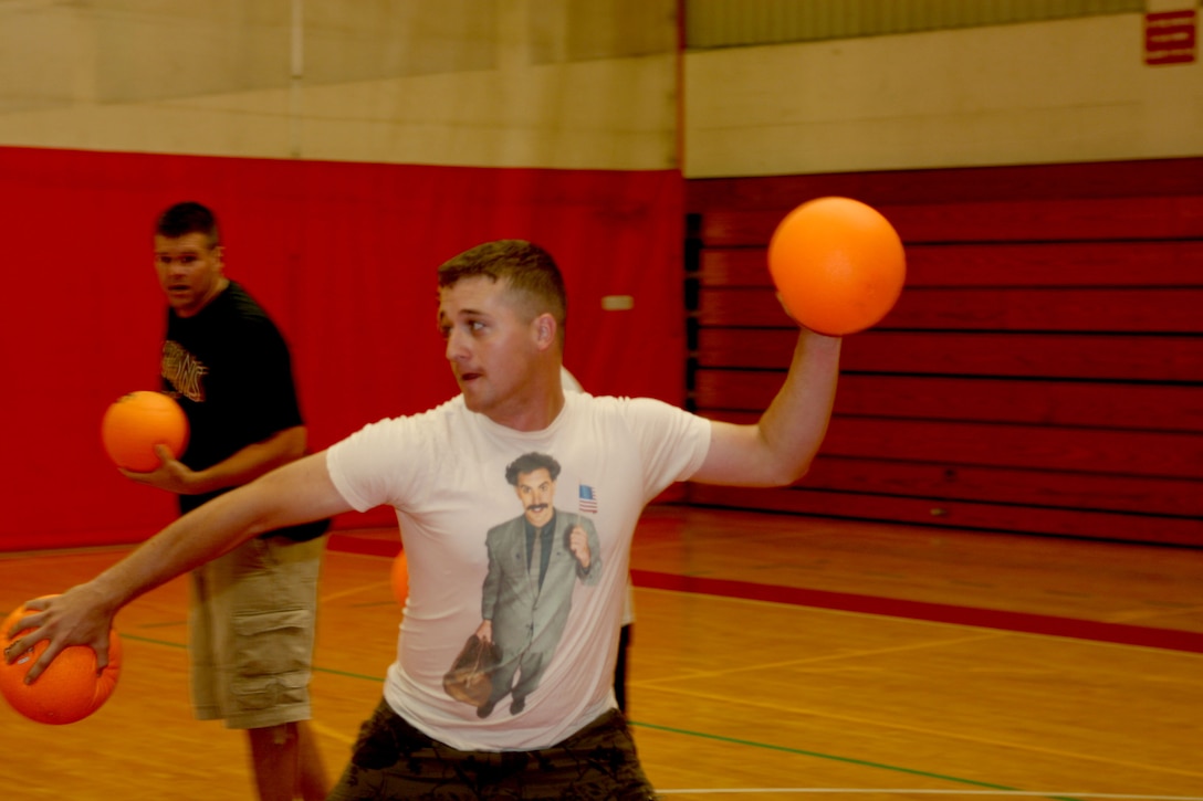 Chris Wliszczak, Marine Corps Air Facilities Renegades player,  rears back as he prepares to throw, during a 101 Days of Summer dodge-ball tournament at the Semper Fit Center Aug. 16.