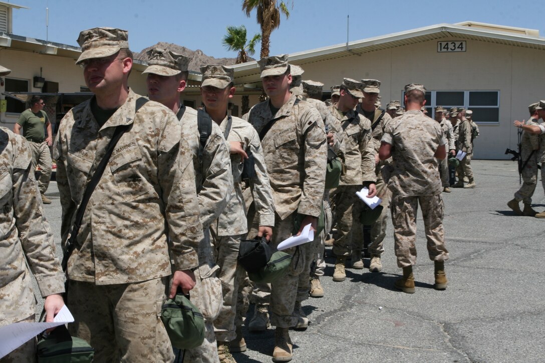 Marines from 2nd Battalion, 24th Marine Regiment, stand in line to turn in their issued weapons and gear after returning to the Combat Center from a seven month deployment to Iraq Saturday. 2/24 is a reserve unit that had more that 1,000 Marines deployed for seven months to Al Anbar Province. The reserve unit’s home base is Chicago.