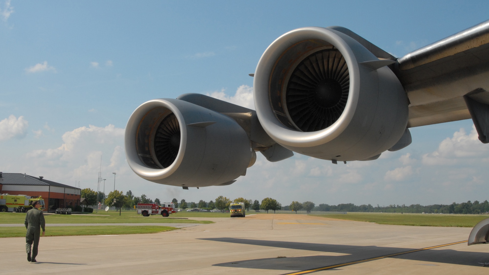 932nd Airlift Wing welcomes Air Force Reserve Command AE JAMBOREE participants as a pilot from the 349th Air Mobility Wing at Travis Air Force Base, Calif., checks his engines after landing at Scott Air Force Base.  (U.S. Air Force photo by Maj. Stan Paregien)