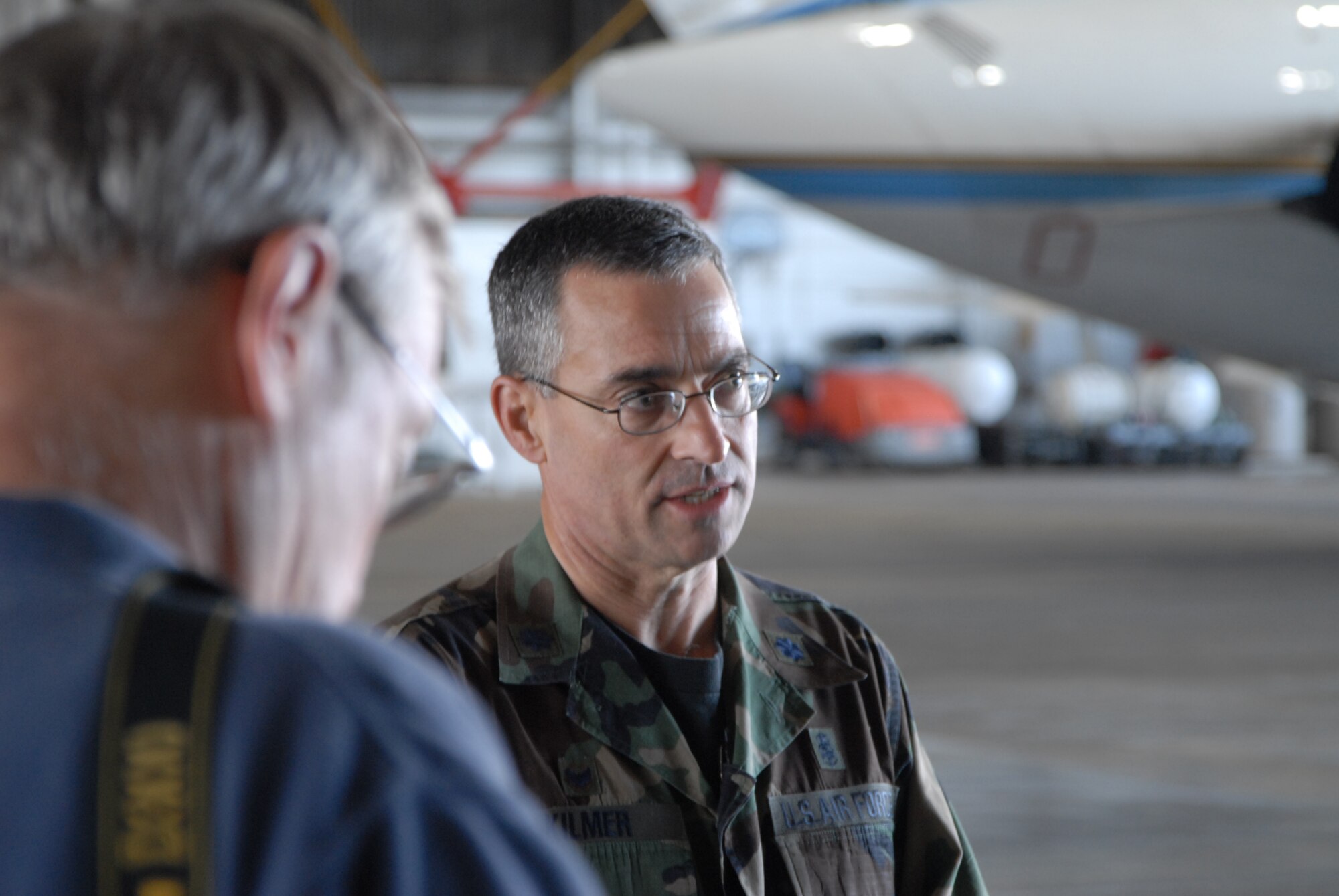 932nd Airlift Wing member Lt. Col Wesley Kilmer talks to a reporter about how aeromedical evacuation specialists are training with several units and three different aicraft during Aeromedical Evacuation JAMBOREE 2008.  (U.S. Air Force photo by Tech. Sgt. Gerald Sonnenberg)