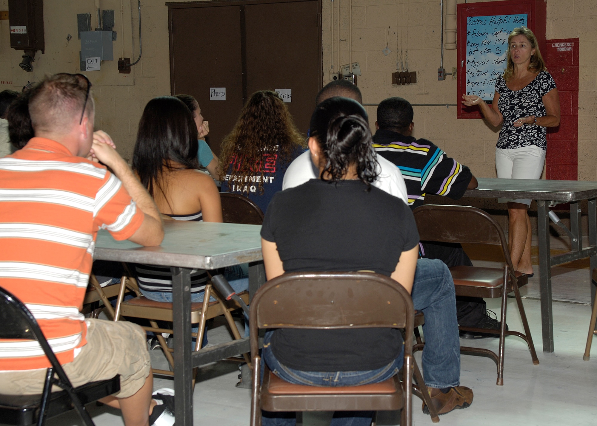 Ms. Maryellen Aviano, Dream Works extras casting coordinator, gives an orientation to members of Team Holloman hoping to play extras for a feature film during a casting call at Holloman AFB, N.M., August 15. Dream Works came to Holloman to shoot scenes for an unnamed feature film. (U.S. Air Force photo/Airman 1st Class Michael Means)