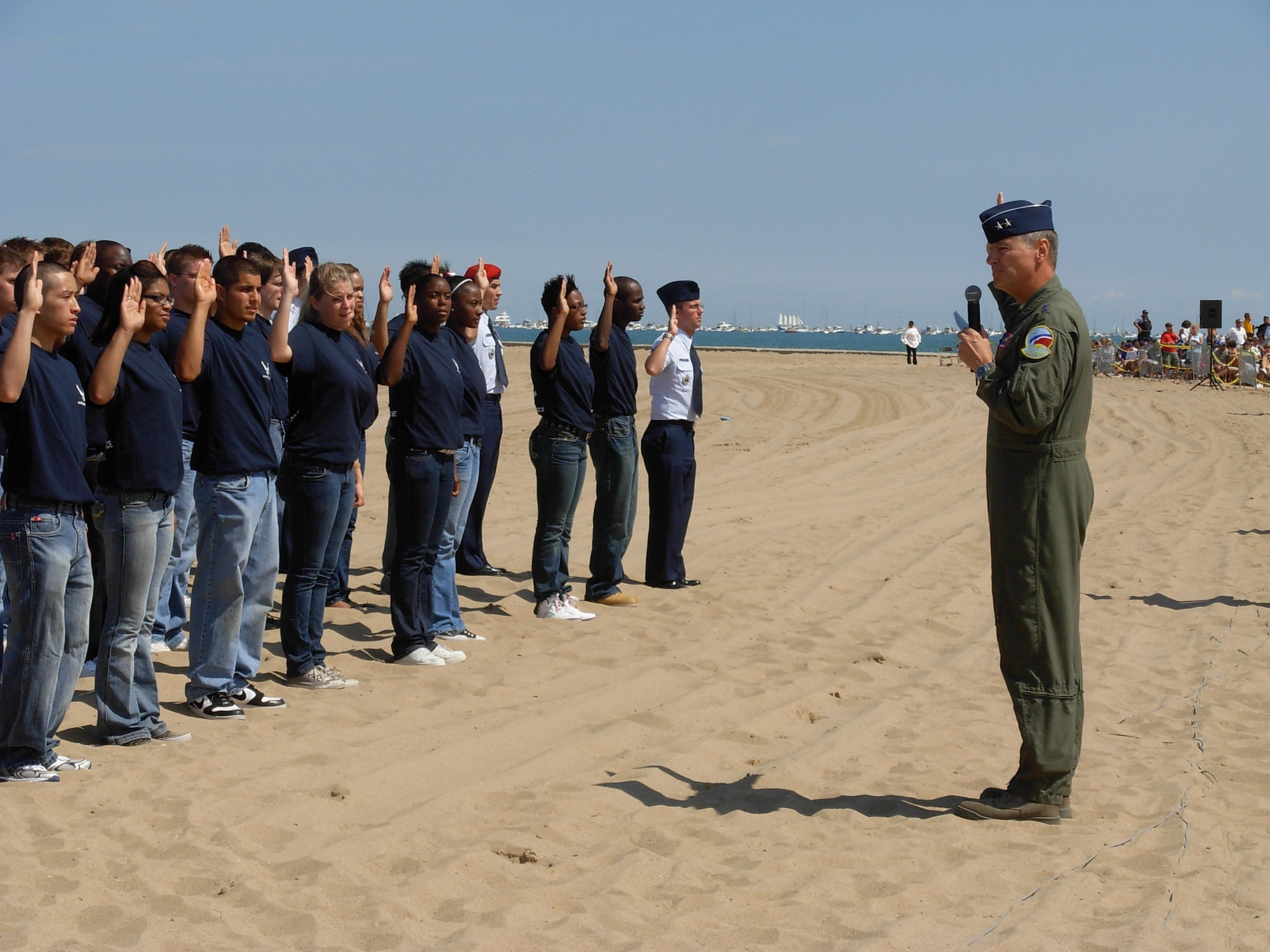 Maj. Gen. Anthony F. Przybyslawski, vice commander of Air Education and Training Command and a Chicago native, administered the oath of enlistment to 60 young men and women Aug. 16 during the 50th Annual Chicago Air and Water Show.  (U.S. Air Force photo/Russ Maheras) 