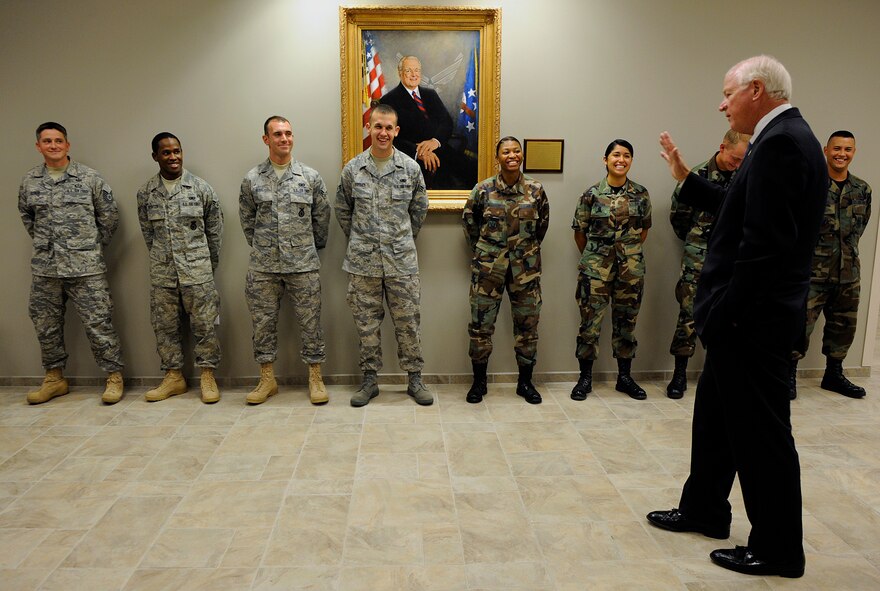 MOODY AIR FORCE BASE, Ga. -- U.S. Sen. Saxby Chambliss addresses Airmen in the hallway of the Parker Greene Consolidated Base Support Center here Aug. 14. Senator Chambliss put the Airmen at ease during his visit to Moody AFB by not only talking about Air Force related matters, but also discussing college football. (U.S. Air Force photo by Senior Airman Brittany Barker)   