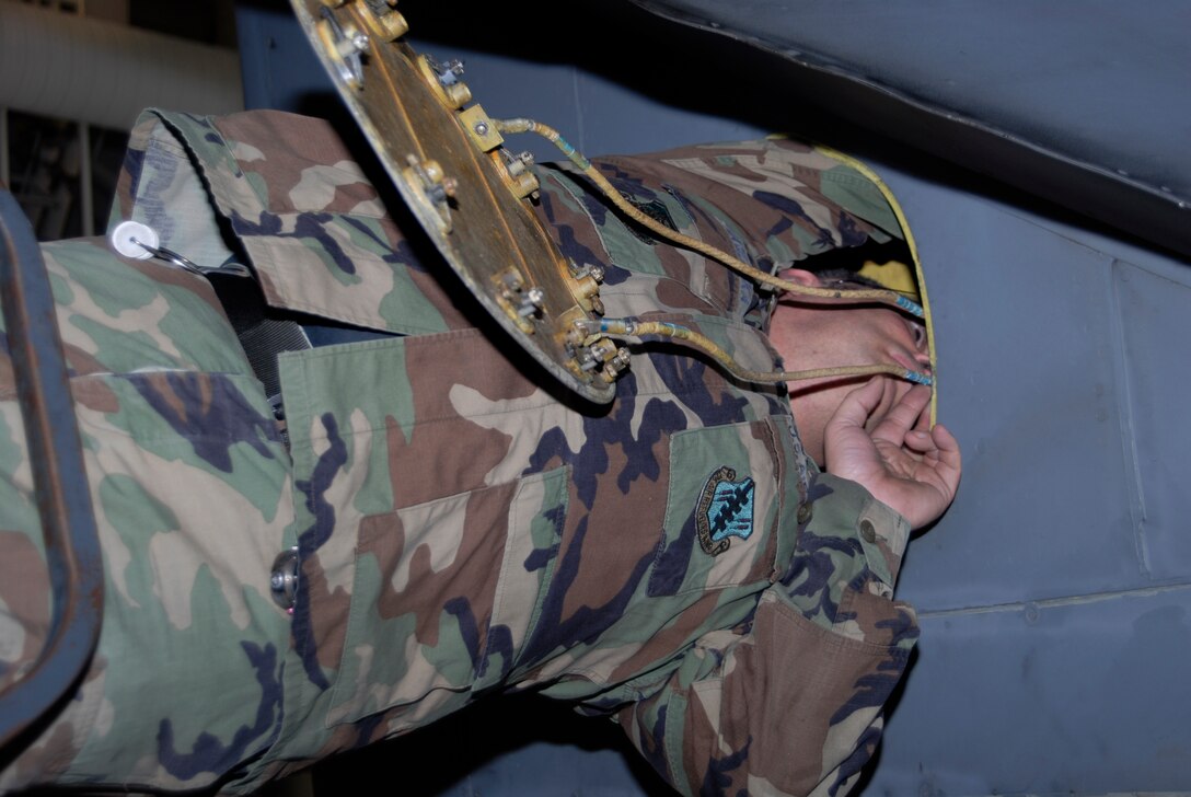 SCOTT AIR FORCE BASE, Ill. - Master Sgt. John Maslanka, a crew chief with the 126th Aircraft Maintenance Squadron, performs a final general safety inspection on a KC-135E Stratotanker as it completes a 60 day regular maintenance cycle.  The 126 AMS is a part of the 126th Air Refueling Wing, Illinois Air National Guard, located at Scott Air Force Base, Ill. (U.S. Air Force photo by Master Sgt. Ken Stephens) (Released)