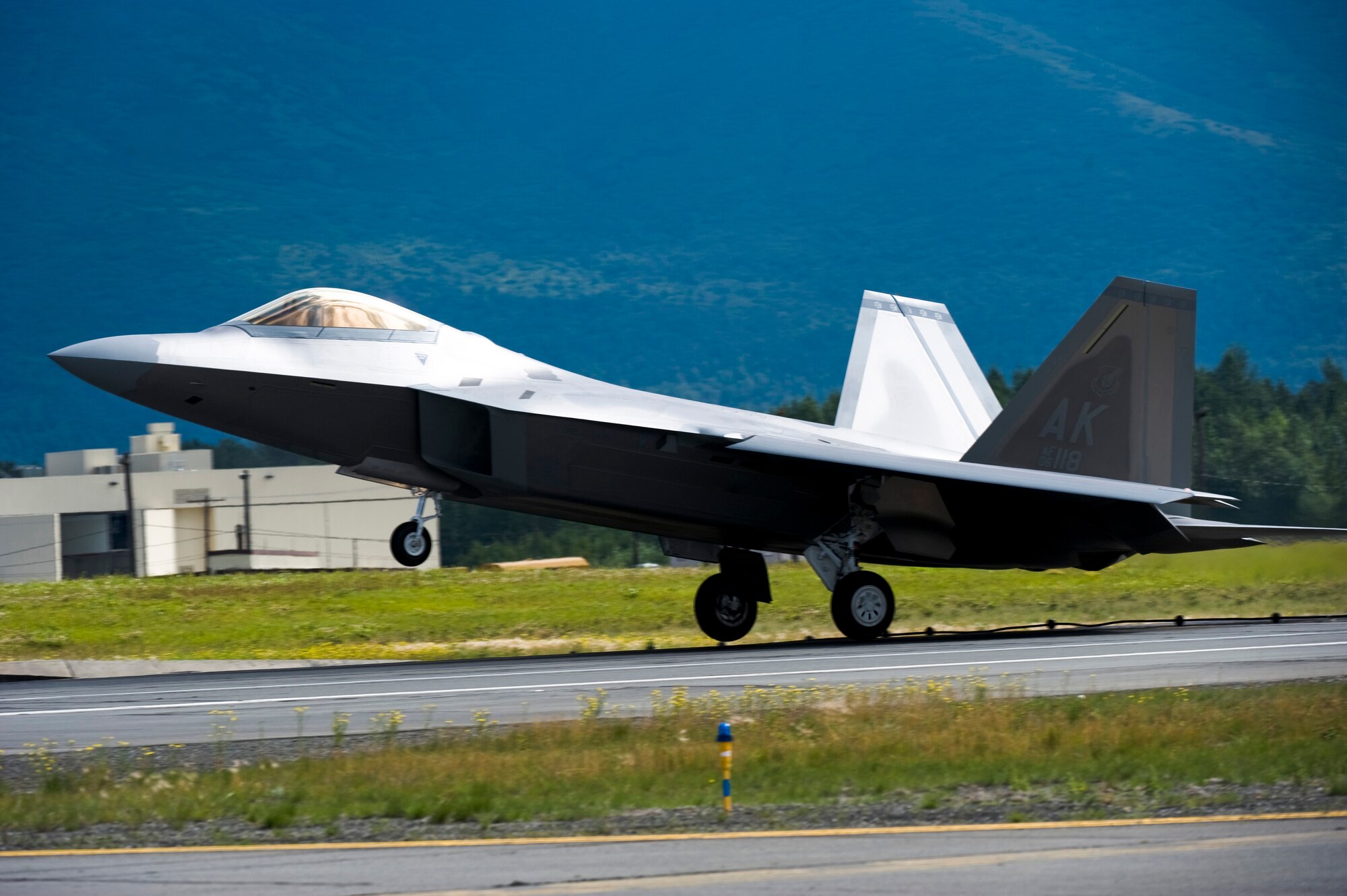 ELMENDORF AIR FORCE BASE, Alaska -- A newly arrived F-22A Raptor touches down Aug. 13. The Raptor is assigned to the 525th Fighter Squadron. (U.S. Air Force photo/Senior Airman Jonathan Steffen)