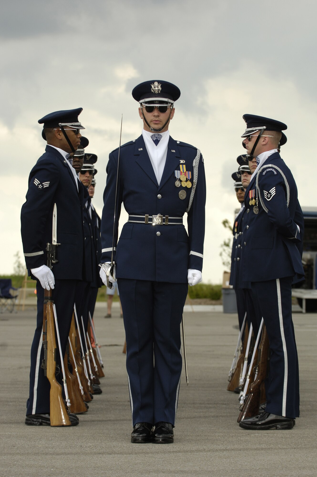 Capt. Brent Mundie, Air Force Honor Guard Drill Team, prepares to walk the "Guantlet" during a 12-man performance Aug. 10 at the Shadow Lakes Mall as part of Air Force week in Omaha, Neb. The drill team is the traveling component of the Honor Guard and tours worldwide representing all Airmen while showcasing Air Force precision. (U.S. Air Force photo by Senior Airman Dan DeCook)