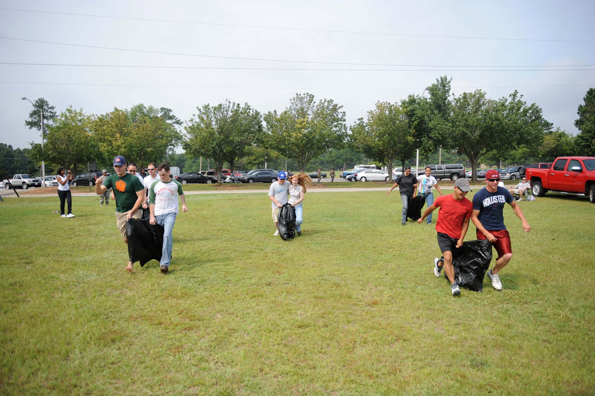 SHAW AIR FORCE BASE, S.C. -- Sack race participants hastily make their way to the finish line during the Junior Enlisted Appreciation Day August 15. JEAD is a day full of fun events set aside to show appreciation for the junior enlisted ranks of the Air Force. (U.S. Air Force photo/Staff Sgt. Henry Hoegen)