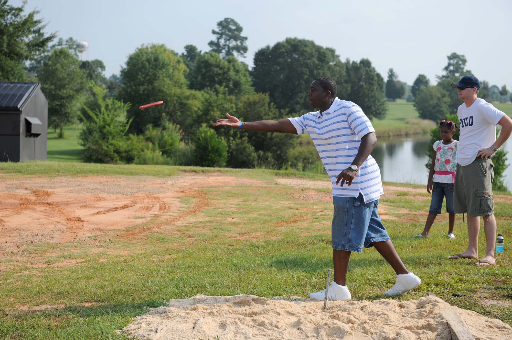 SHAW AIR FORCE BASE, S.C. -- Staff Sgt. Lawrence Beamon, 20th Civil Engineering Squadron, tosses a horseshoe during the horseshoe tournament held as part of the Junior Enlisted Appreciation Day festivities August 15. JEAD is a day full of fun events set aside to show appreciation for the junior enlisted ranks of the Air Force. (U.S. Air Force photo/Staff Sgt. Henry Hoegen)