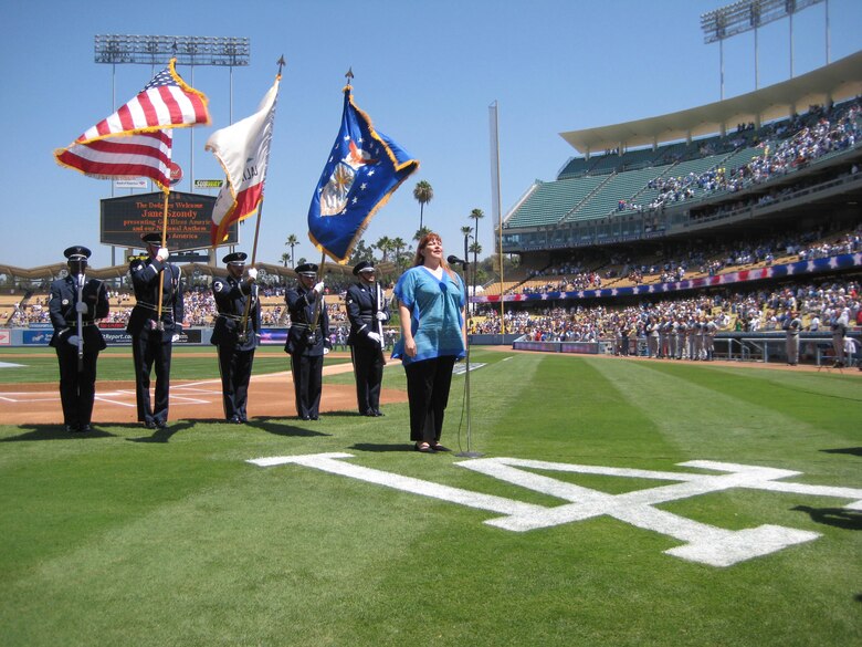 LOS ANGELES --  Members of the Vandenberg Air Force Base Honor Guard present the colors during the National Anthem for the Dodgers vs. Brewers baseball game at Dodgers Stadium Sunday.  The Brewers were defeated 7 to 5 in the bottom of the ninth after the Dodgers own Andre Ethier smashed a two-run homer to right field. (Courtesy photo / Randy M. Jackson)