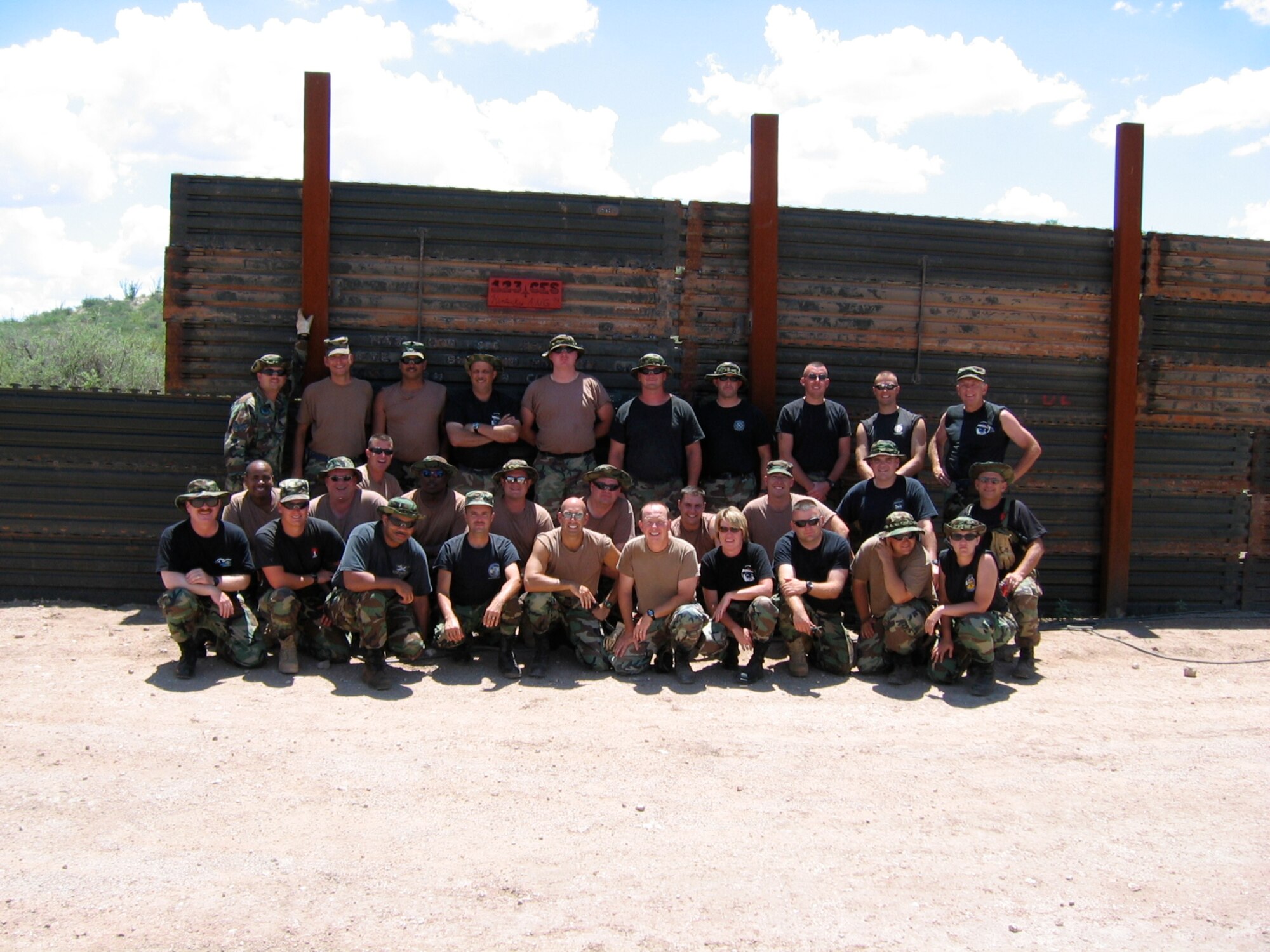 Members of the 123rd Civil Engineering Squadron in front of the border.
(Photos courtesy 123rd Maintenance Squadron and 123rd Civil Engineering Squadron)