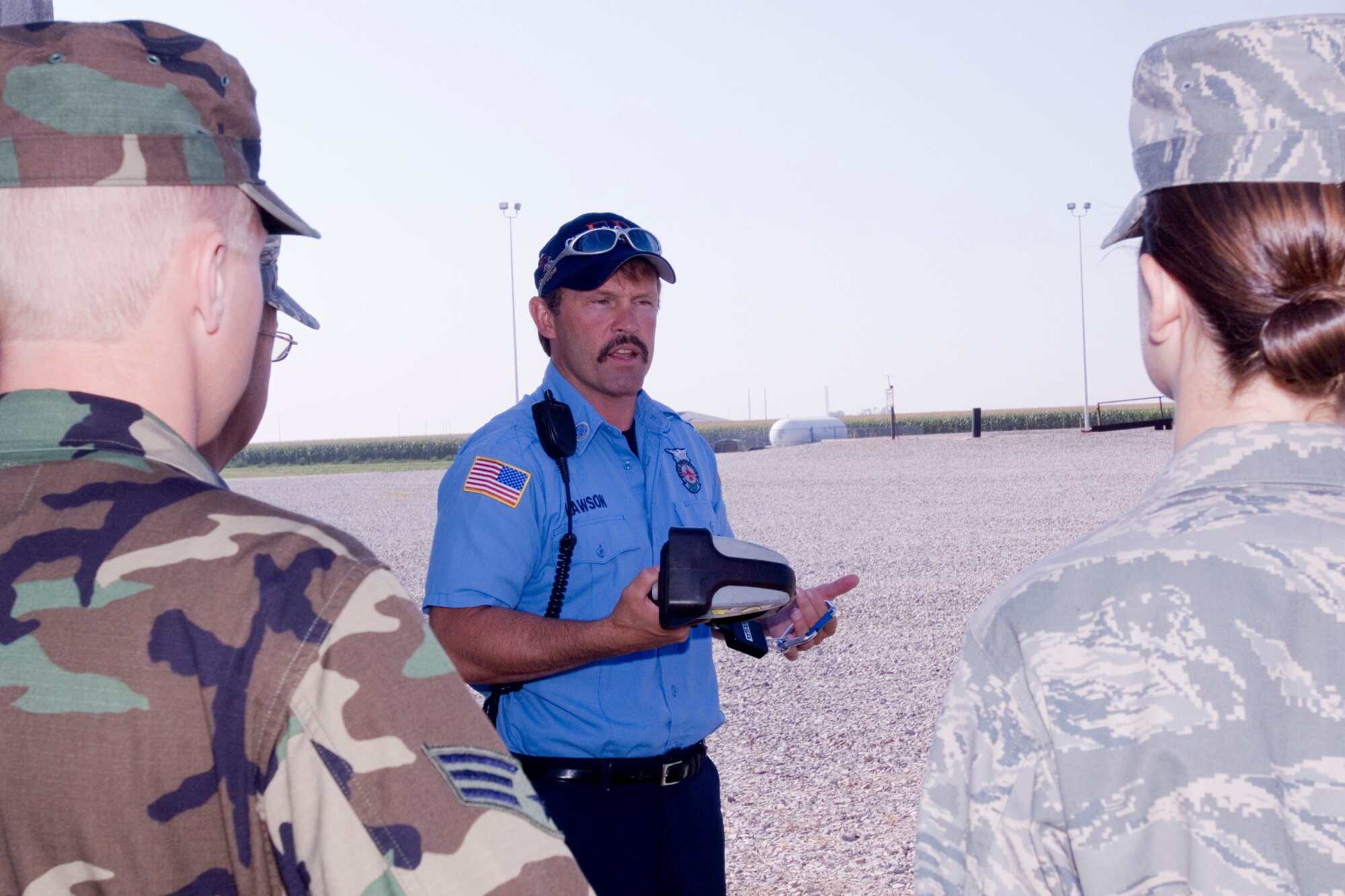 GRISSOM AIR RESERVE BASE, Ind., -- Howard Lawson, a firefighter with the Grissom Fire Department, briefs members on the use of a thermal imaging device that can help locate victims in a dark and smokey environment. The fire department conducted hands on demonstrations for base employees recently.  (U.S. Air Force photo/Tech. Sgt. Doug Hays)