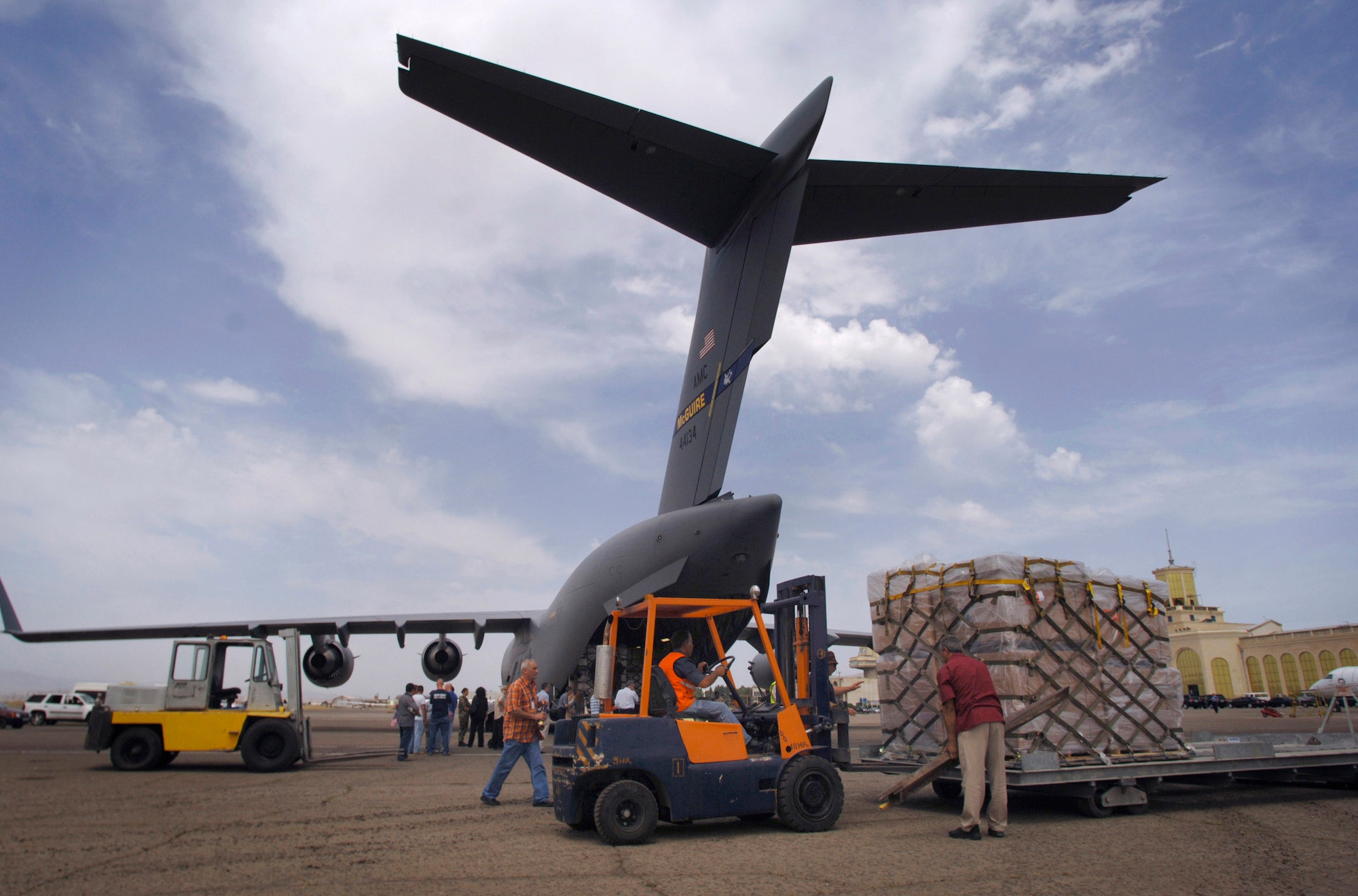 A C-17 Globemaster III from McGuire Air Force Base, N.J., delivers humanitarian aid to a civilian airport in Tbilisi,  Republic of Georgia, Aug. 14. The delivery was a joint-service effort between U.S Army Europe Soldiers, U.S. Air Forces Europe and Air Mobility Command Airmen. (U.S. Air Force photo/Master Sgt. Scott Wagers)