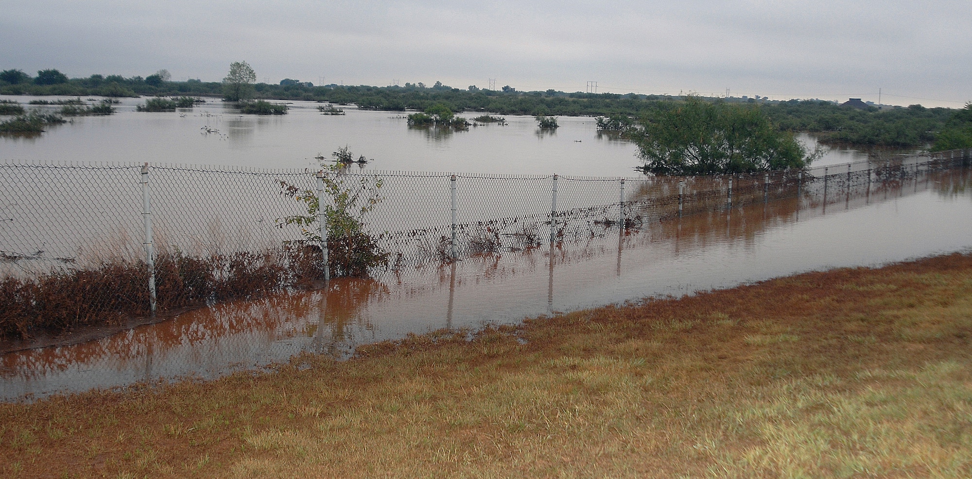 A low-lying area of Sheppard Air Force Base sits under water Aug. 19 after heavy rains pelted the base and Wichita County, Texas, much of the night. (U.S. Air Force photo/Lou Anne Sledge)