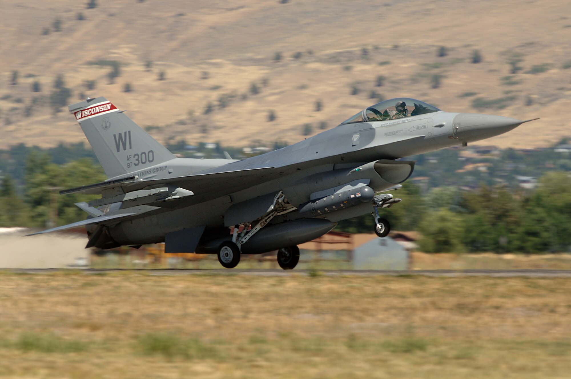 A U.S. Air Force F-16C Fighting Falcon from the Madison 115th Air National Guard, Wisconsin lands after a mission in support of Sentry Eagle on 7 Aug. 2007 Sentry Eagle, the Air National Guard's largest air-to-air exercise, provides military pilots of the National Guard, Active Duty and Reserve components a forum in which to test their flying skills including basic fighter maneuvers and air combat tactics against different types of aircraft, large force employment training. U.S. Air Force photo by Staff Sgt. Aaron Allmon.
