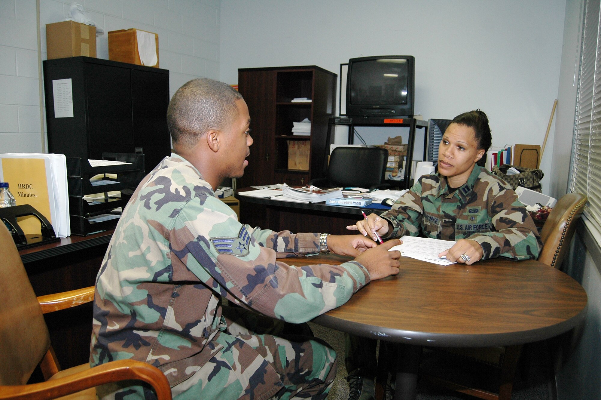 Capt. Marlene Heath-Yorke,  94th AW  Equal Opportunity chief, counsels an Airman at the 94th EO office.  EO counseling is a tool used to intake information.  When a member comes to EO to file a complaint, the EO professionals discuss the options an Airman has, but highly encourage the informal route for handling their complaints.  