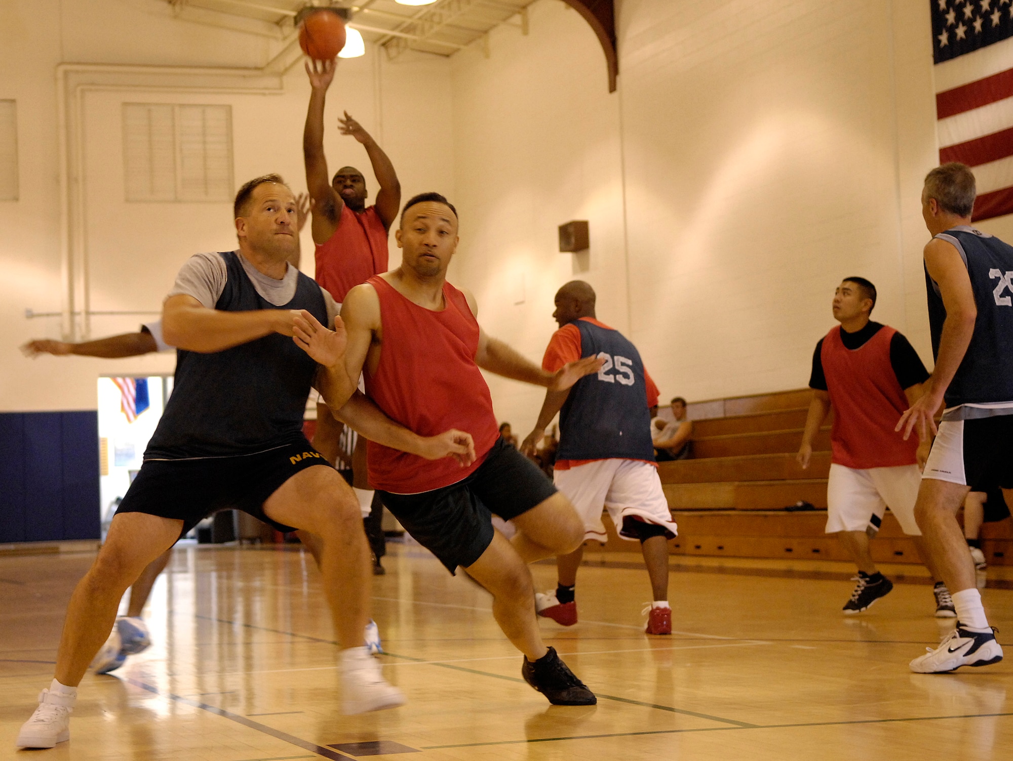 VANDENBERG AIR FORCE BASE, Calif. --  Fred McCree, 30th Medical Group (center back), shoots a 3-pointer during the Medical Group vs. 14th Air Force Over-30 League playoff game on Aug. 12.  (U.S. Air Force photo/Airman 1st Class Jonathan Olds)