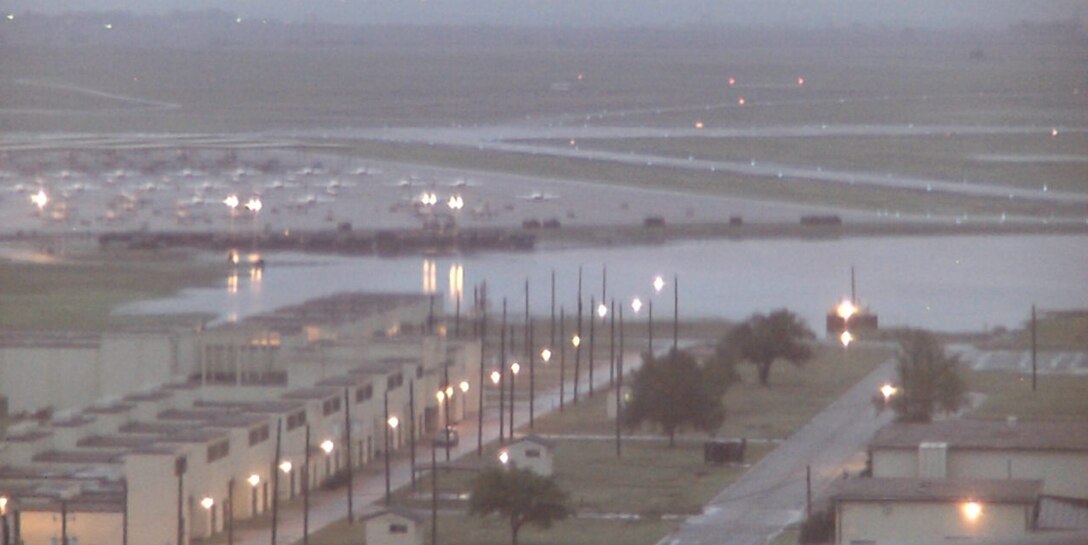 This early-morning photo shows areas of flooding near the 80th Flying Training Wing Aug. 19 after a storm system dumped more than 9 inches of rain over Sheppard and much of Wichita County, Texas, in a 48-hour span. Several facilities and at least three base housing homes rceived flood damage, but an official estimate has not been released. (Photo courtesy of the 80th Operations Support Squadron)