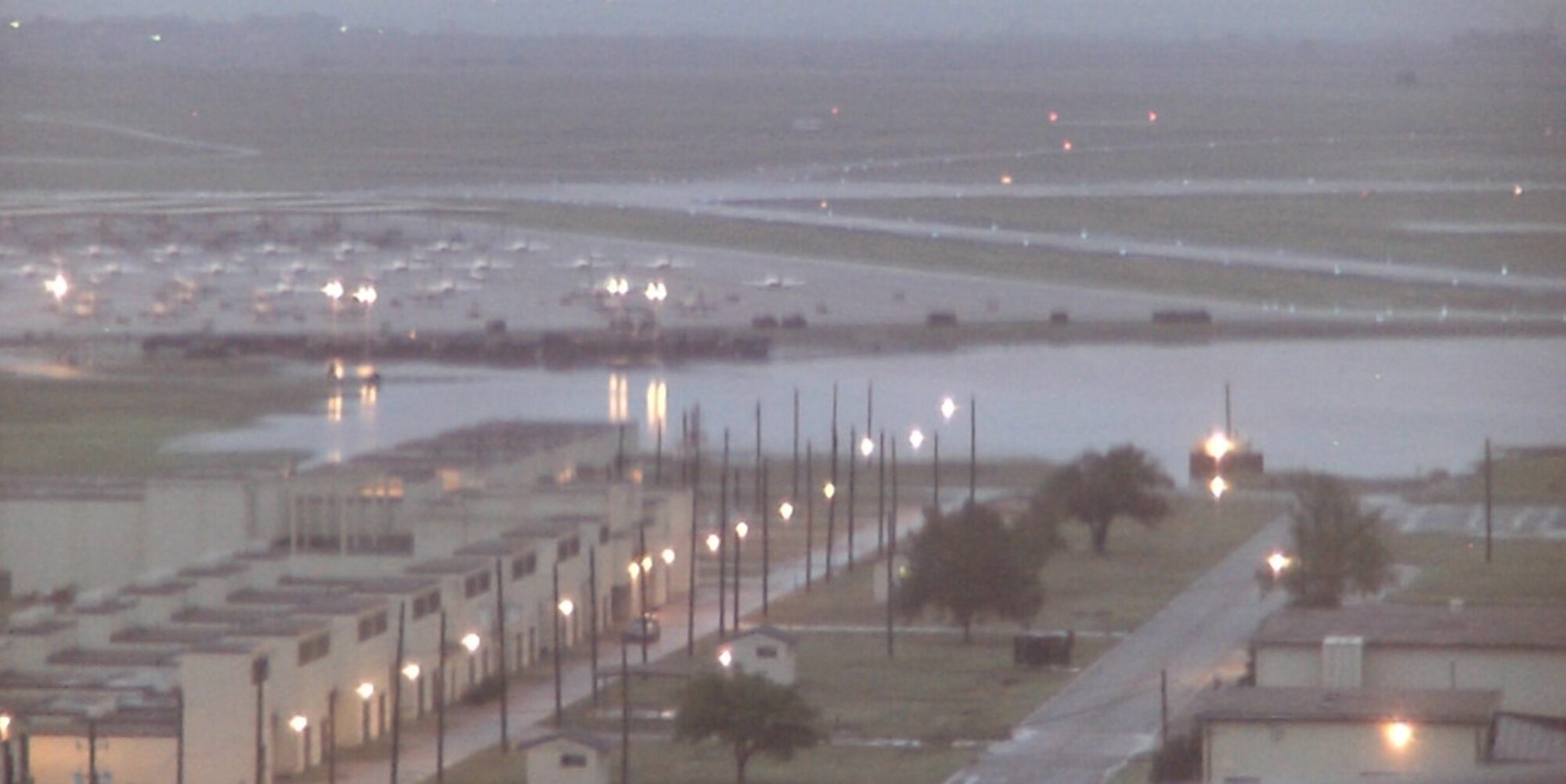 This early-morning photo shows areas of flooding near the 80th Flying Training Wing Aug. 19 after a storm system dumped more than 9 inches of rain over Sheppard and much of Wichita County, Texas, in a 48-hour span. Several facilities and at least three base housing homes rceived flood damage, but an official estimate has not been released. (Photo courtesy of the 80th Operations Support Squadron)