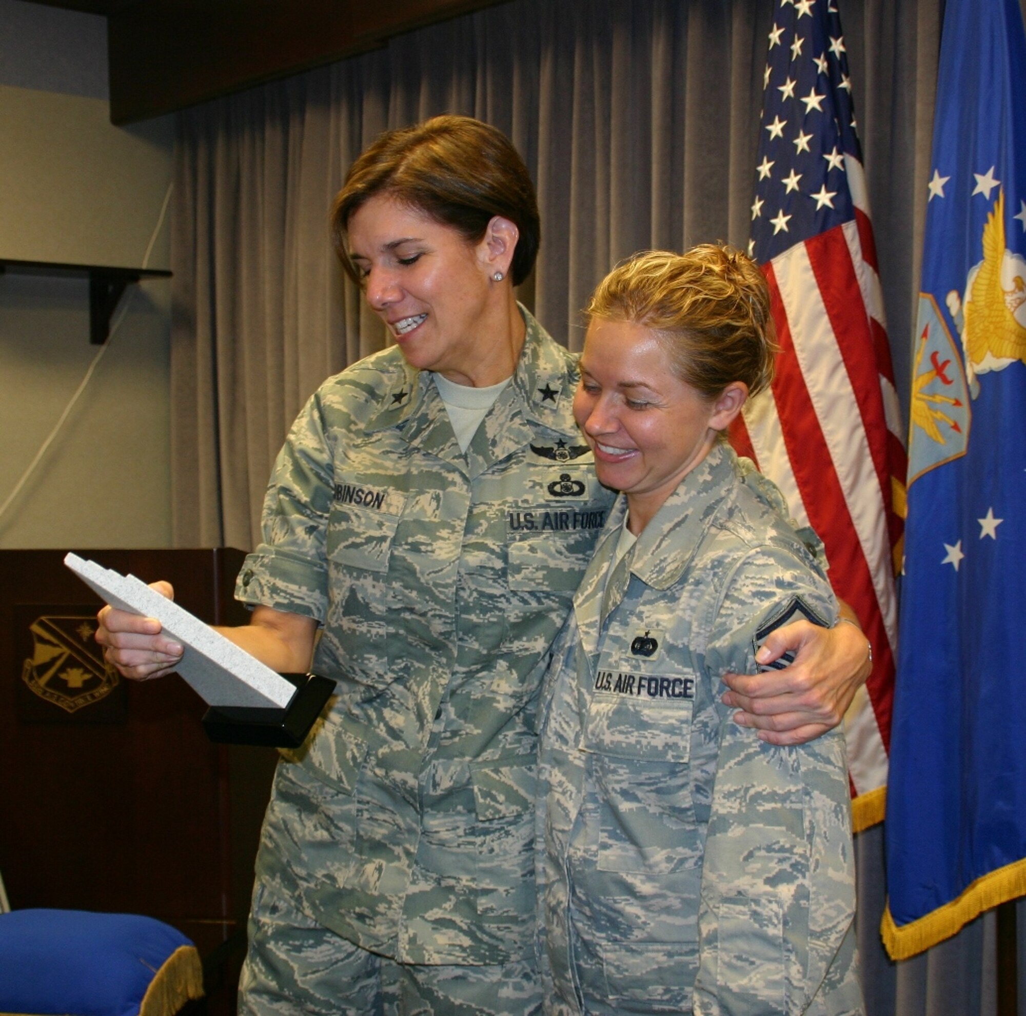 General Robinson presented a quarterly award to Master Sgt. Glenda Ipock. Photo courtesy of 2nd Lt. Kinder Blacke.