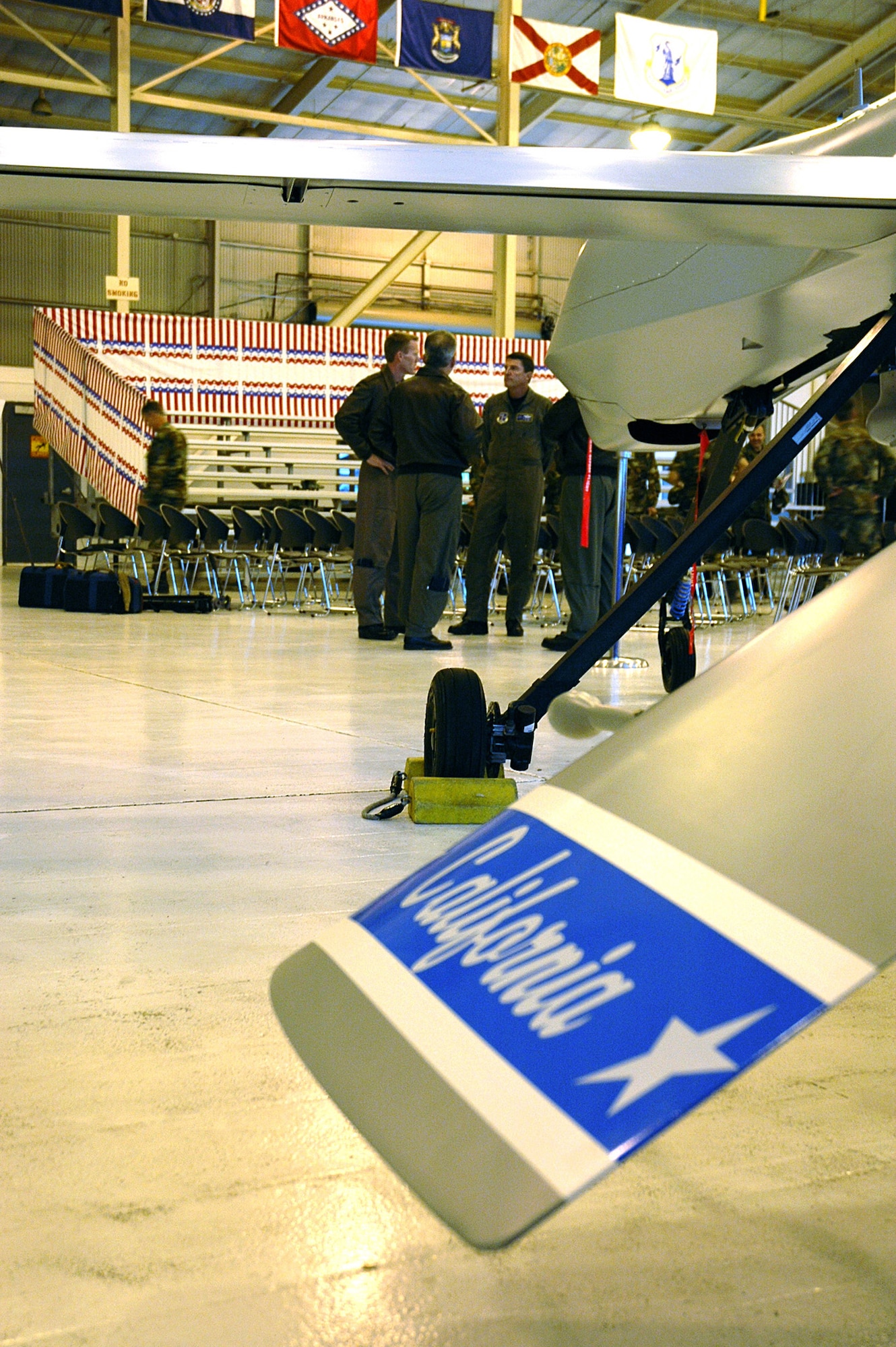 California Air National Guard MQ-1 Predator pilots meet in their hanger at March Air Reserve Base in November 2006 following the activation ceremony for the 196th Reconnaissance Squadron. The Air Guard squadron operates three combat air patrols in Iraq from the squadron's base operations center. (Photo by Master Sgt. Mike R. Smith, National Guard Bureau)