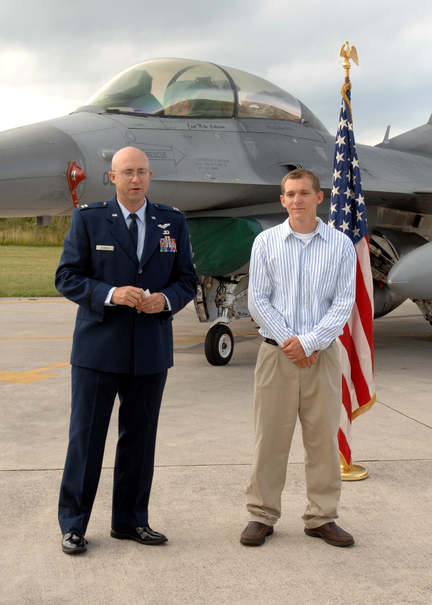 AVIANO AIR BASE, Italy --  Capt. Charles Hudson of the 603rd Air Control Squadron and his son Marcus Hudson thank members of the 510th Fighter Squadron, 603rd ACS, and other family and friends who joined in Marcus' enlistment ceremony Aug. 12.  (U.S. Air Force photo/Airman 1st Class Tabitha M. Mans)