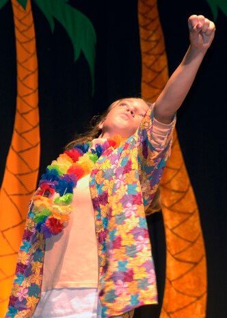 Brittany Moore acts out as she dances during a scene for ?The Amazing Adventures of Robinson Crusoe? play held at the base theater Aug. 16. Brittany, 15, is the daughter of Master Sgt. Eugene Morre and his wife Shelly. (U.S. Air Force photo/Airman 1st Class Timothy Taylor)