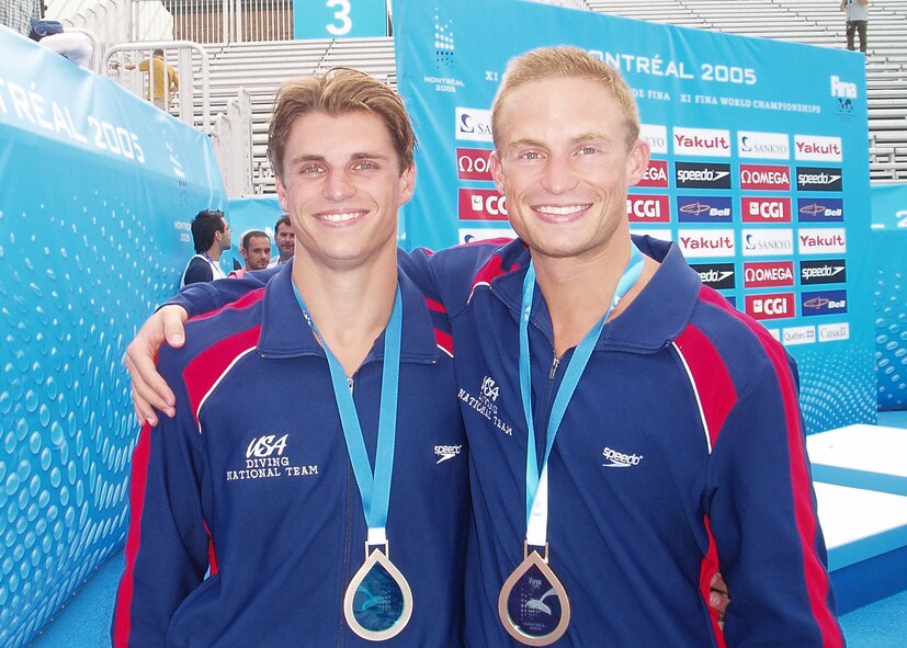 1st Lt. Justin Dumais, student F-16 pilot assigned to 310th Fighter Squadron, stands with his brother, Troy, at the 2005 World Championships in Montreal. The brothers competed in the 3-meter men's syncronized dive and earned a bronze medal. Troy (left) competed in the 2008 Beijing Olympics. (courtesy photo)
