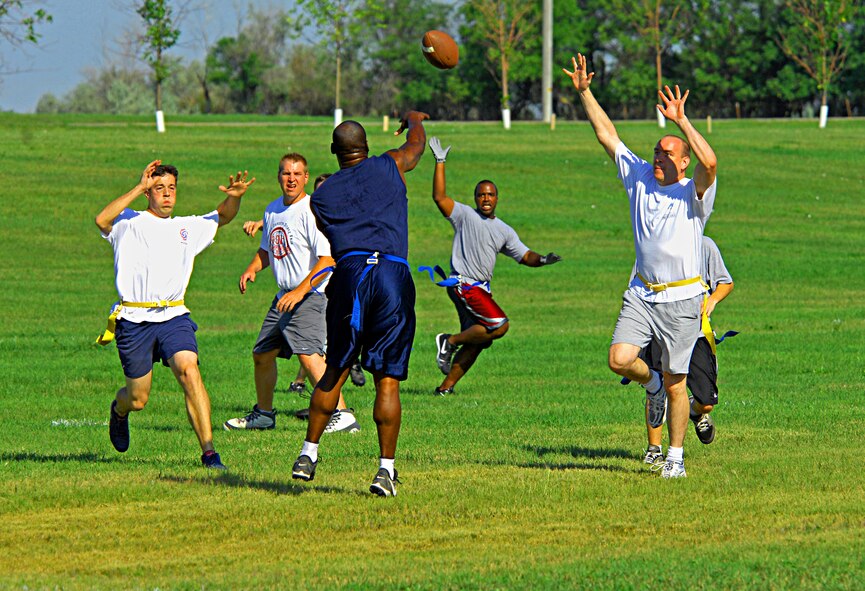 MINOT AIR FORCE BASE, N.D. -- The 5th Operations Support Squadron enjoys a game of flag football here Aug. 15 at Bud Ebert Park. The football game was just one of the events held that day. (U.S. Air Force photo by Airman 1st Class Benjamin Stratton)