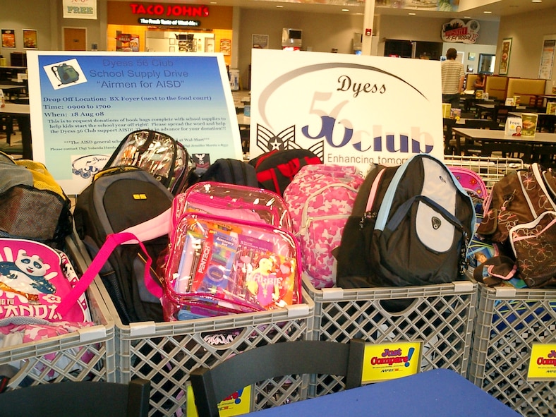 DYESS AIR FORCE BASE, Texas -- Dyess 56 Club held a backpack and school supply drive Aug. 18 at the Base Exchange to give some Abilene Independent School District students a head start for the new school year. Volunteers collected 47 backpacks full of school supplies filled with everything from scissors and glue to notebooks and pencils, worth a total of $1,544. (Photo by Tech. Sgt. Yolanda Hands)
