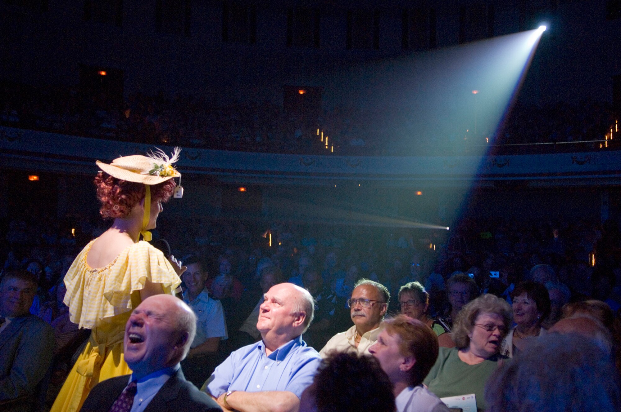 HANSCOM AFB, Mass. – A member of the Tops in Blue cast, dressed as Minnie Pearl, interacts with the audience during the “Expeditionary Entertainers” performance at the Lowell Memorial Auditorium, Lowell, Mass., on Aug. 18. (U.S. Air Force photo by Mark Wyatt)