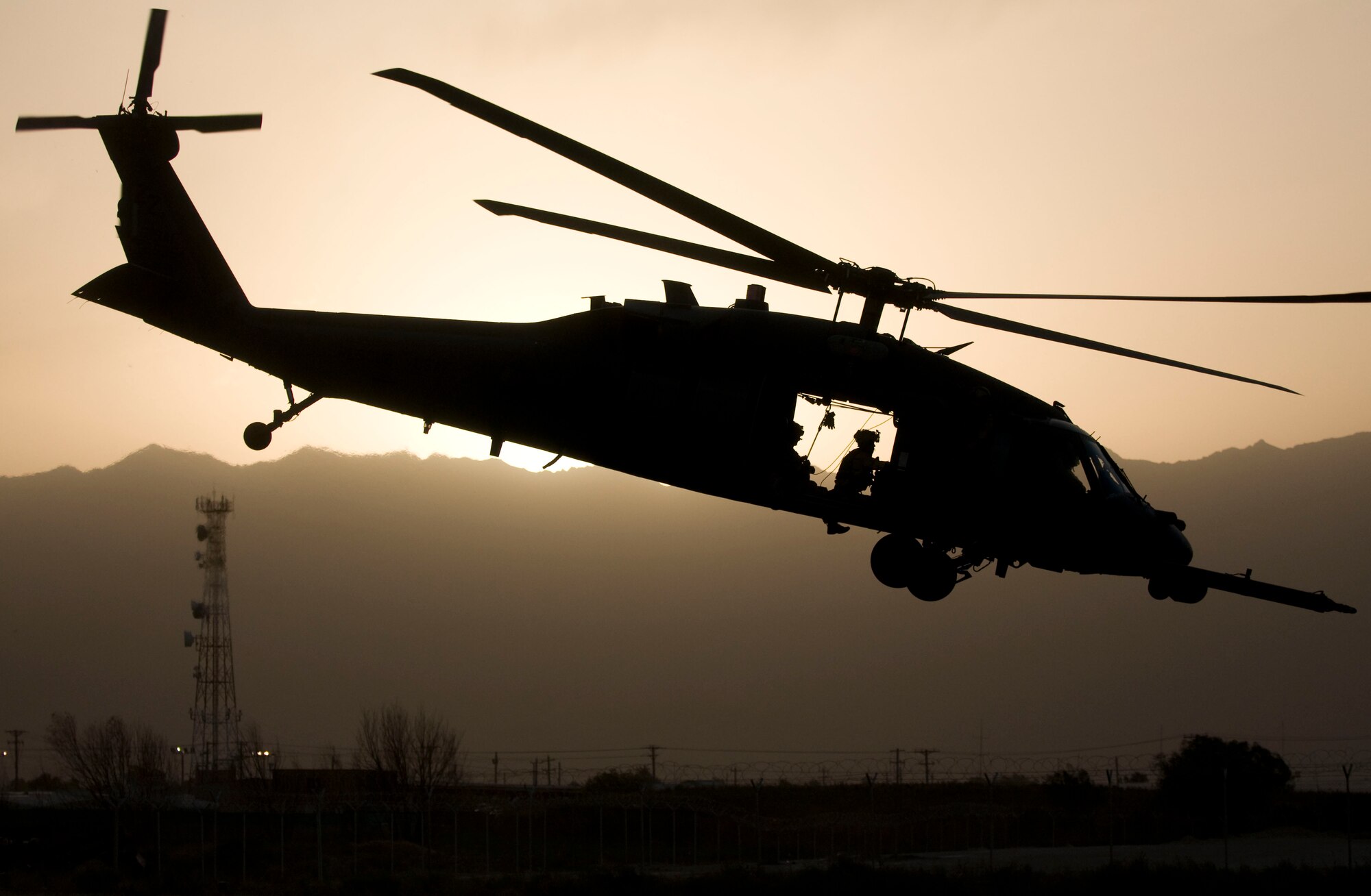 An Air Force HH-60G Pave Hawk takes off for a medical evacuation mission as the sun sets over Bagram Air Field, Afhanistan, Aug. 16. Although primarily used for combat search and rescue, the Pave Hawk supplements the Army’s UH-60 Black Hawks in medical evacuations during night and marginal weather conditions. (U.S. Air Force photo by Staff Sgt. Samuel Morse/Released)