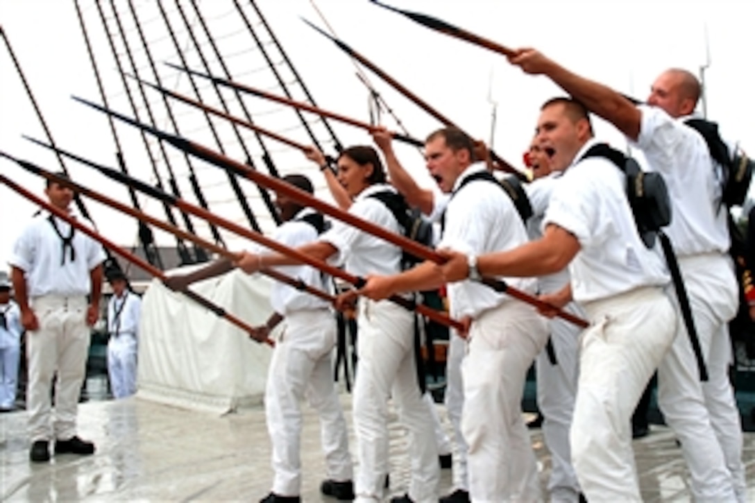 The USS Constitution's boarding pike team demonstrates an early 19th century drill that sailors and Marines used to repel enemies from boarding the ship during a re-enactment of the ship's battle against the HMS Guerriere at Charlestown Navy Yard, Mass., Aug. 15, 2008. More than 65 guests and military officials joined the captain and crew for this second annual observance of the battle.