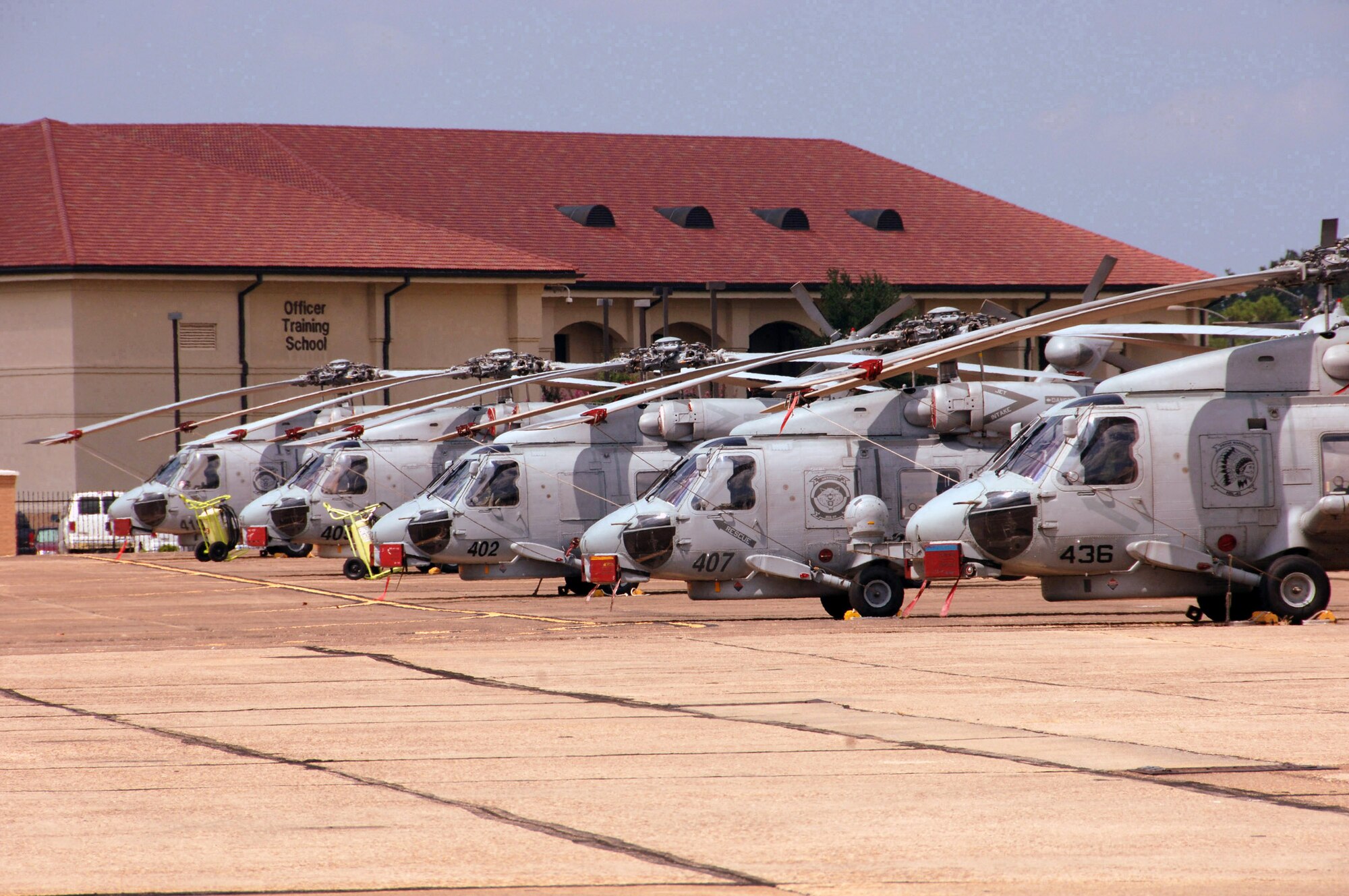 SH-60B Seahawks line up Aug. 20 at Maxwell Air Force Base, Ala. Based at Naval Station Mayport in Jacksonville, Fla., nearly three dozen Seahawks and 157 personnel flew to Maxwell AFB for shelter from Tropical Storm Fay. (U.S. Air Force photo/Donna Burnett) 

