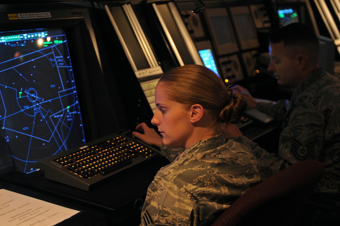 Senior Airman Laura Washer, 5th Operations Support Squadron journeyman, monitors air traffic at the new Radar Approach Control facility here, Aug. 20. The new facility, called the Dakota Air Traffic Control Facility, will provide radar air traffic services to Ellsworth and Minot Air Force Base, N.D., along with Rapid City Regional Airport, Minot International Airport and numerous small airports within the airspace. (U.S. Air Force photo/Airman Corey Hook)