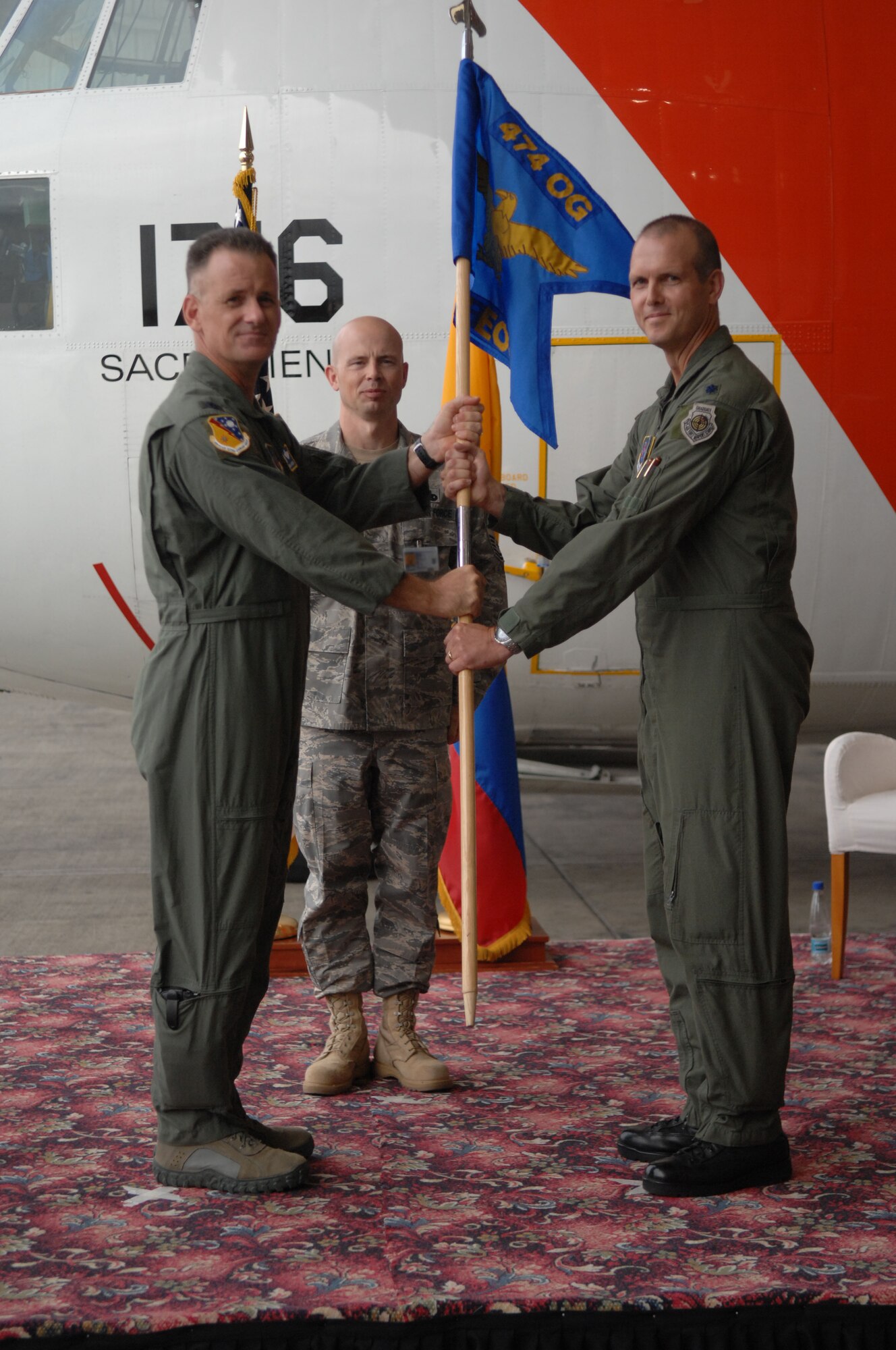 Lt. Col. Jared Curtis formally assumes command of the 478th Expeditionary Operations Squadron Forward Operating Location Manta, Ecuador, from Colonel Douglas Galipeau, 474th Air Expeditionary Group commander, during a change of command ceremony here August 20. Formerly the Operations Officer for the 61st Airlift Squadron, 463rd Airlift Group, Little Rock Air Force Base, Ark., Lt. Col. Curtis
will be the eighth officer to command the 478th Expeditionary Operations Squadron since it’s designation on July 25, 2002. (U.S. Air Force Photo/1Lt. Lauren Wright)