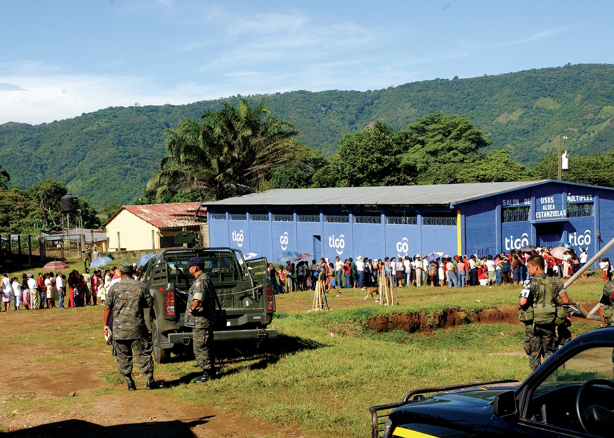 A line of Guatemalans waits for members of the 163rd Medical Group to provide medical treatment Aug. 18 in Santa Rosa, Guatemala. Thirty-one members of the 163rd Reconnaisance Wing traveled to the country to provide medical care during a U.S. Air Forces South-sponsored medical readiness training exercise. The team provided treatment for more than 500 people. (U.S. Air Force photo/Capt. Al Bosco) 
