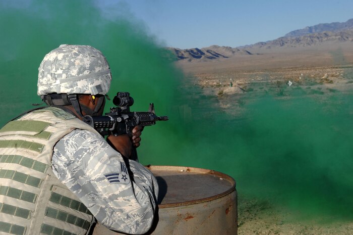 Senior Airman Joseph Steel, 99th Security Forces Squadron, trains on the M-4 during target practice on the firing range near Creech Air Force Base, Nev. Aug. 11, 2008. The 99th Ground Combat Training Squadron recently began a new forty-five day training course called Joint Base Balad, which is designed for security forces personnel and chaplains to train to embed with the Army stationed there, and eventually take over all Army operations outside the wire at Joint Base Balad, Iraq.
(U.S. Air Force Photo/Senior Airman Larry E. Reid Jr.) 