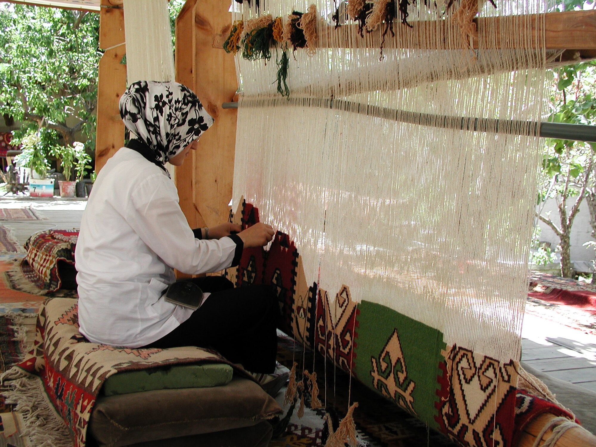 Turkish rugs are popular souvenirs for Airmen who deploy to Incirlik Air Force Base, Turkey. Tech. Sgt. Robert Lorenz took this photo of a Turkish woman weaving a rug by hand during his recent deployment to Incirlik. Sergeant Lorenz returned to McConnell Air Force Base, Kan., on Aug. 17 with the last of three personnel rotations his unit, the 931st Aircraft Maintenance Squadron, deployed to Turkey in support of Operations Iraqi and Enduring Freedom. 