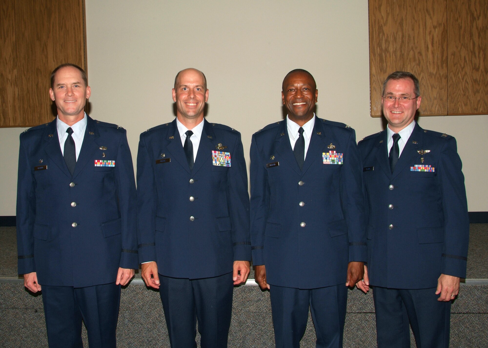 Four newly promoted Colonels; Erik Ostrem, Gary McCue Michael Howard and Dan Clark (left to right) at the 179th Airlift Wing, Mansfield Ohio. Col Michael Howard is the first black colonel at this air national guard base.  (U.S. Air Force photo by Technical Sgt. Lisa Haun) (Released)