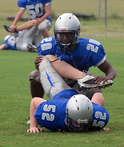 Randolph High School Ro-Hawk football team members practice Aug. 18 for their upcoming season. The Ro-Hawks will open their season Aug. 29 at Marion High School. (U.S. Air Force photo by Rich McFadden)