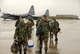 Fifty-one members of the 123rd Airlift Wing board a Kentucky Air Guard C-130 on the
base flightline Nov. 26. The Airmen are bound for Ramstein Air Base, Germany, from
which they will fly airlift sorties to locations in Europe, Africa and Southwest Asia. (Tech. Sgt. Philip Speck/KyANG)