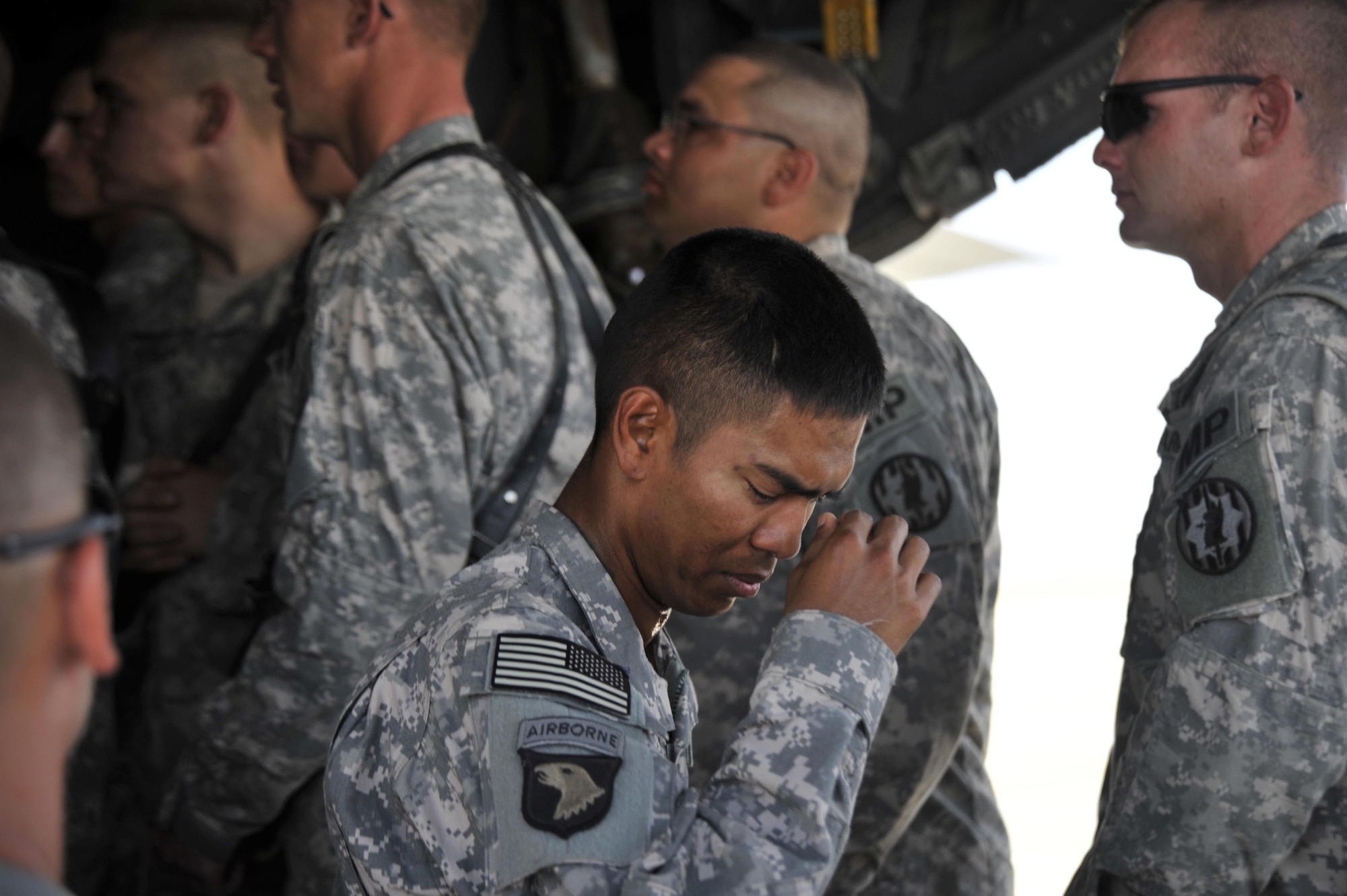 8/14/2008 - SATHER AIR BASE, Iraq ? Cpl. Aaron Carson, a Soldier with the 978th Military Police Company, leaves the aircraft that carried the body of fellow Soldier and friend Cpl. James Hale home from Iraq. Soldiers from the 978th MP Company and Airmen from the 447th Air Expeditionary Group gathered to provide patriot honors to Corporal Hale, who was killed July 13 in Baghdad by a roadside bomb.  The patriot ceremony marks the beginning of the journey home for U.S. service members killed while serving in deployed locations. (U.S. Air Force Photo by Master Sgt. Brian Davidson)