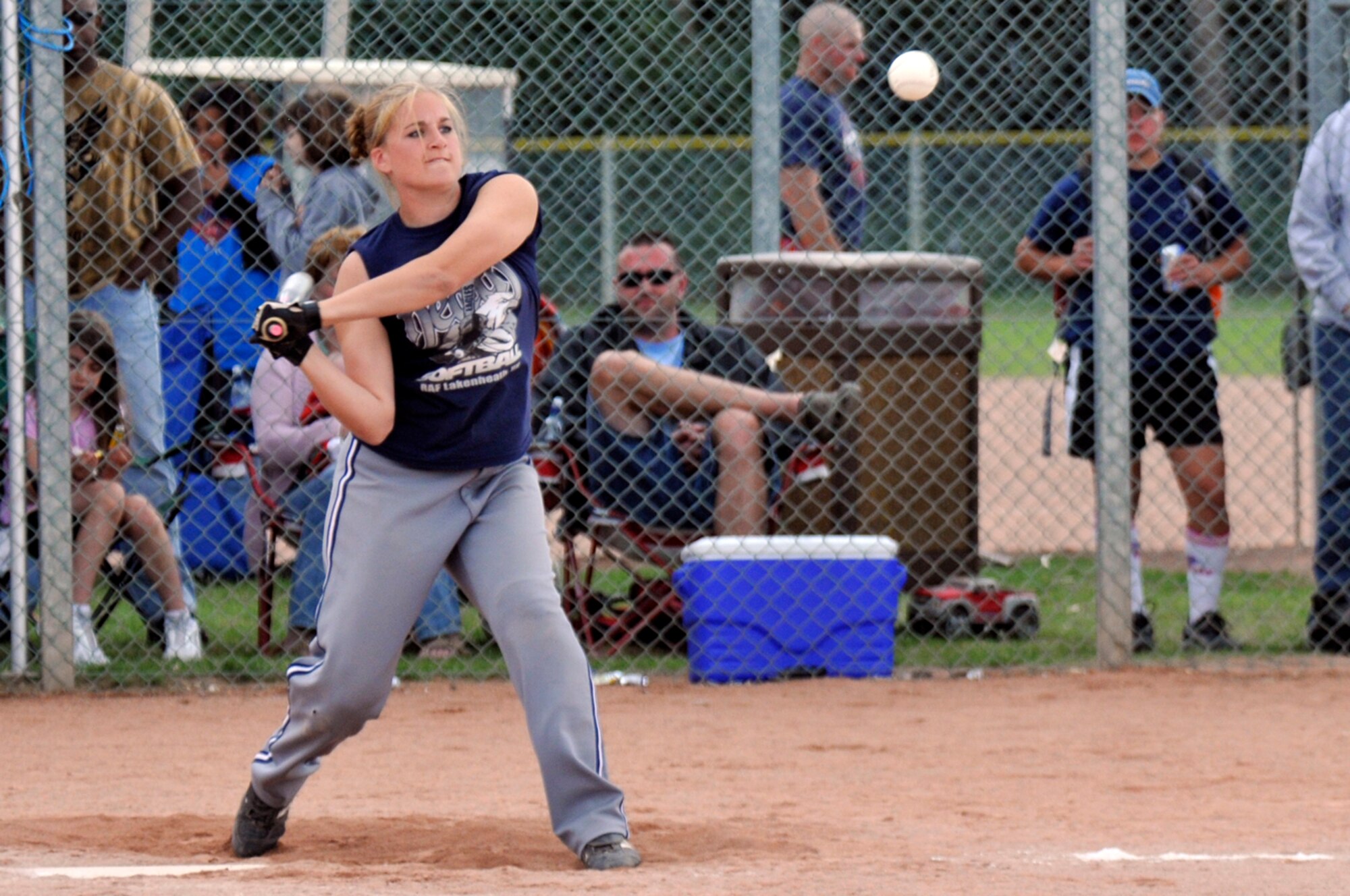 Megan Johnson, shortstop for the Lakenheath Lady Eagles hammers the ball into the outfield Aug. 16 at RAF Lakenheath, England. The Lady Eagles will compete in the Army/Air Force Softball Championship Aug. 21 to 24 in Germany. (U.S. Air Force photo by Airman Perry Aston)